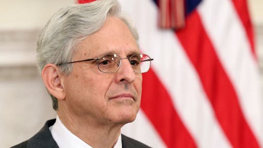 Merrick Garland WASHINGTON, DC - JUNE 23: U.S. Attorney General Merrick Garland looks on as President Joe Biden delivers remarks on gun crime prevention measures at the White House on June 23, 2021 in Washington, DC. President Joe Biden pledged to aggressively go after illegal gun dealers and to boost federal spending in aid to local law enforcement. (Photo by Kevin Dietsch/Getty Images)