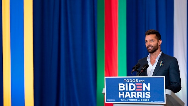 Ricky Martin, a Puerto Rican singer, songwriter, and humanitarian, speaks before Democratic Presidential Candidate Joe Biden as they participate in a Hispanic Heritage Month event at the Osceola Heritage Park in Kissimmee, Florida on September 15, 2020.