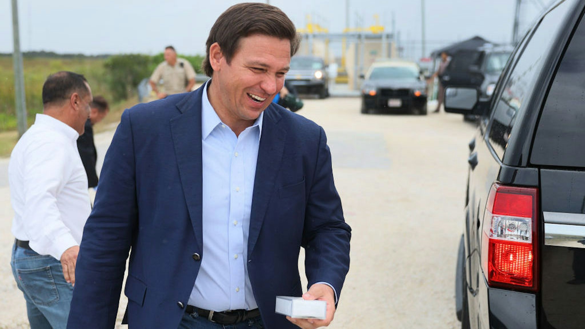 MIAMI, FLORIDA - JUNE 03: Florida Gov. Ron DeSantis leaves after holding a press conference to kickoff the 2021 Python Challenge in the Everglades on June 03, 2021 in Miami, Florida. The 10-day event will run from July 9 to 18, with prizes going to participants who catch the most and the biggest pythons. The event began as a way for hunters to help control the population of the invasive Burmese python in the Florida Everglades. (Photo by Joe Raedle/Getty Images)