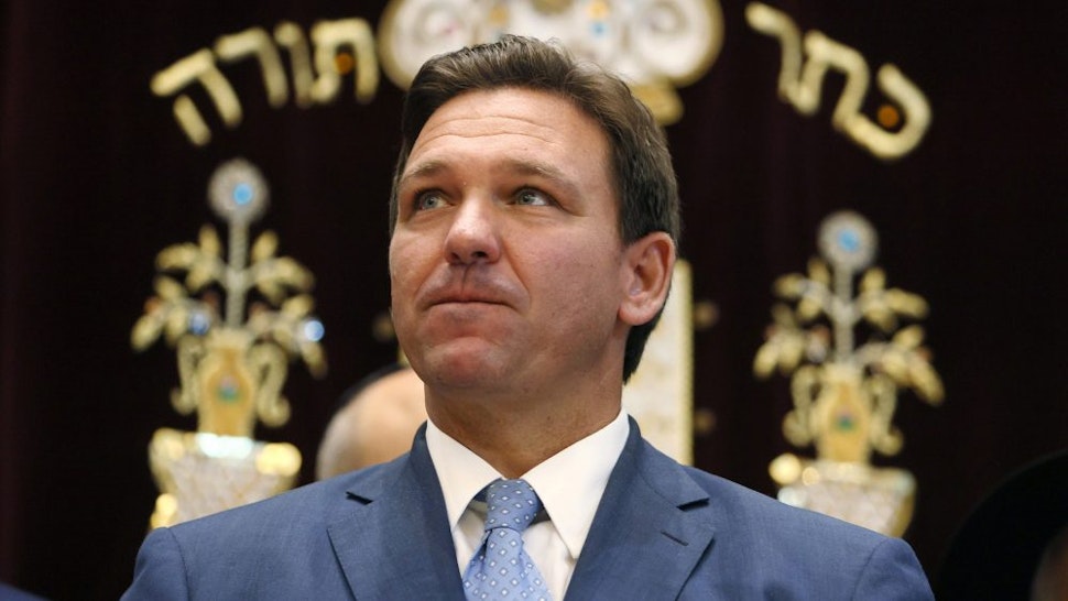 SURFSIDE, FLORIDA - JUNE 14: Florida Gov. Ron DeSantis attends a press conference at the Shul of Bal Harbour on June 14, 2021 in Surfside, Florida. The governor spoke about the two bills he signed HB 529 and HB 805. HB 805 ensures that volunteer ambulance services, including Hatzalah, can operate. HB 529 requires Florida schools to hold a daily moment of silence.