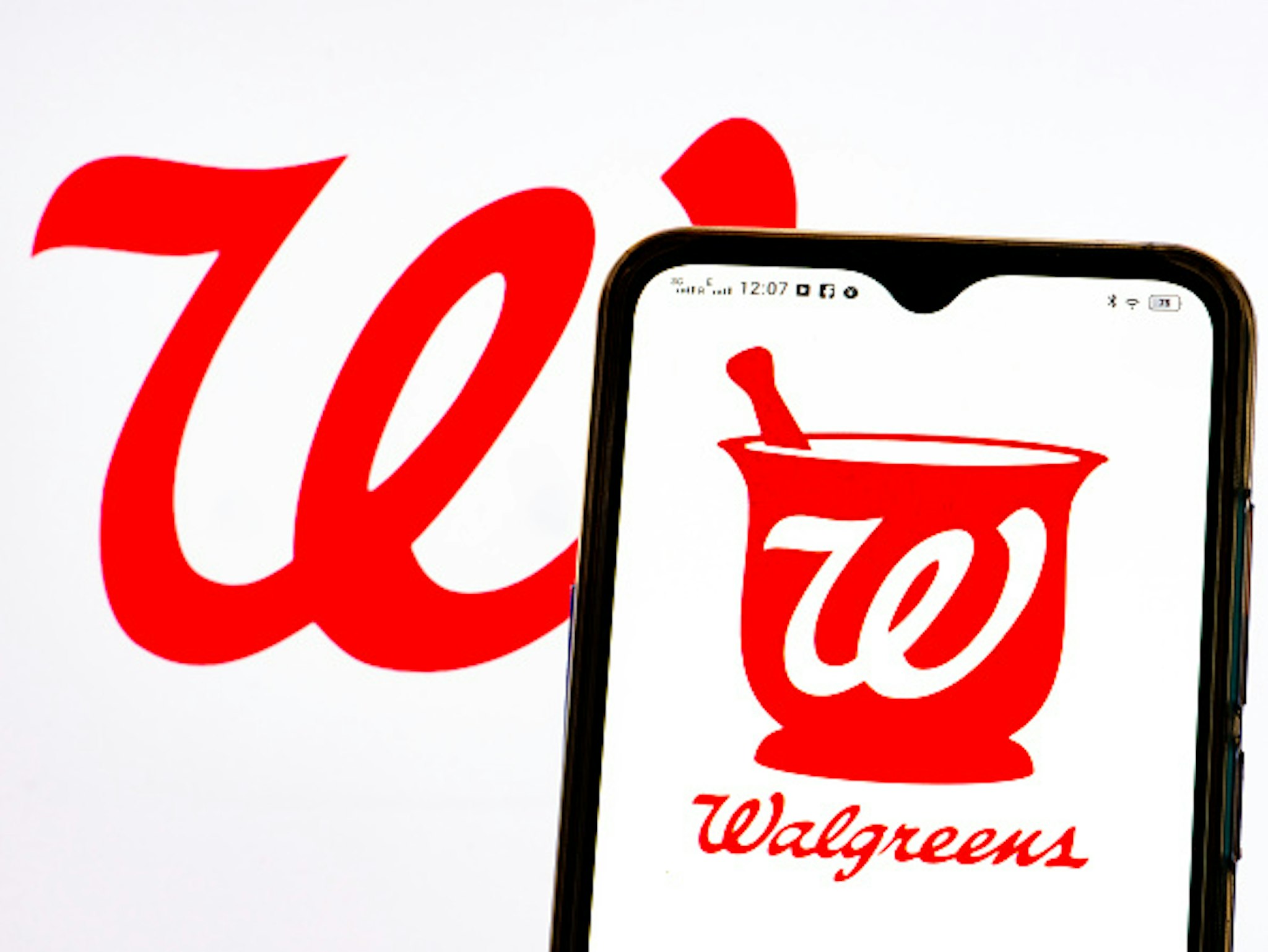 UKRAINE - 2021/05/23: In this photo illustration a Walgreen Company logo seen displayed on a smartphone.