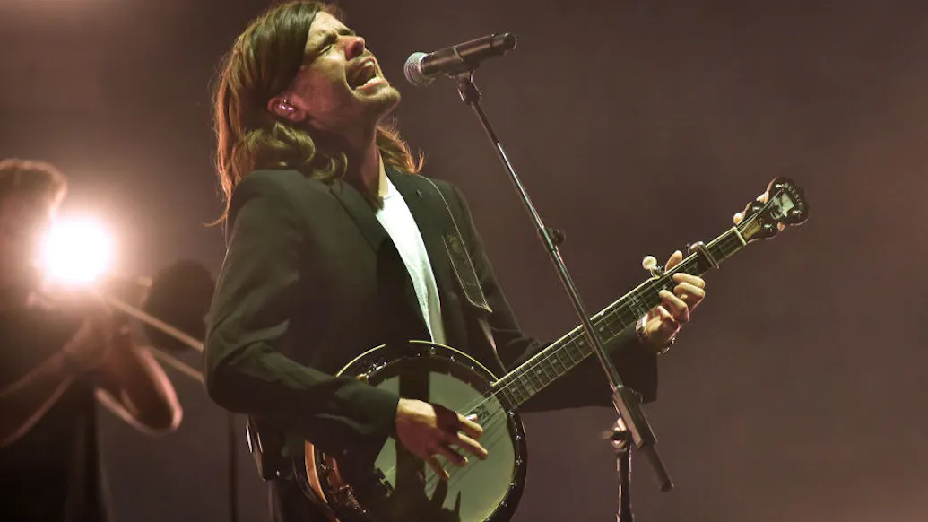 Mumford & Sons Guitarist Announces He’s Leaving Band To ‘Speak His Mind’ On Political Issues