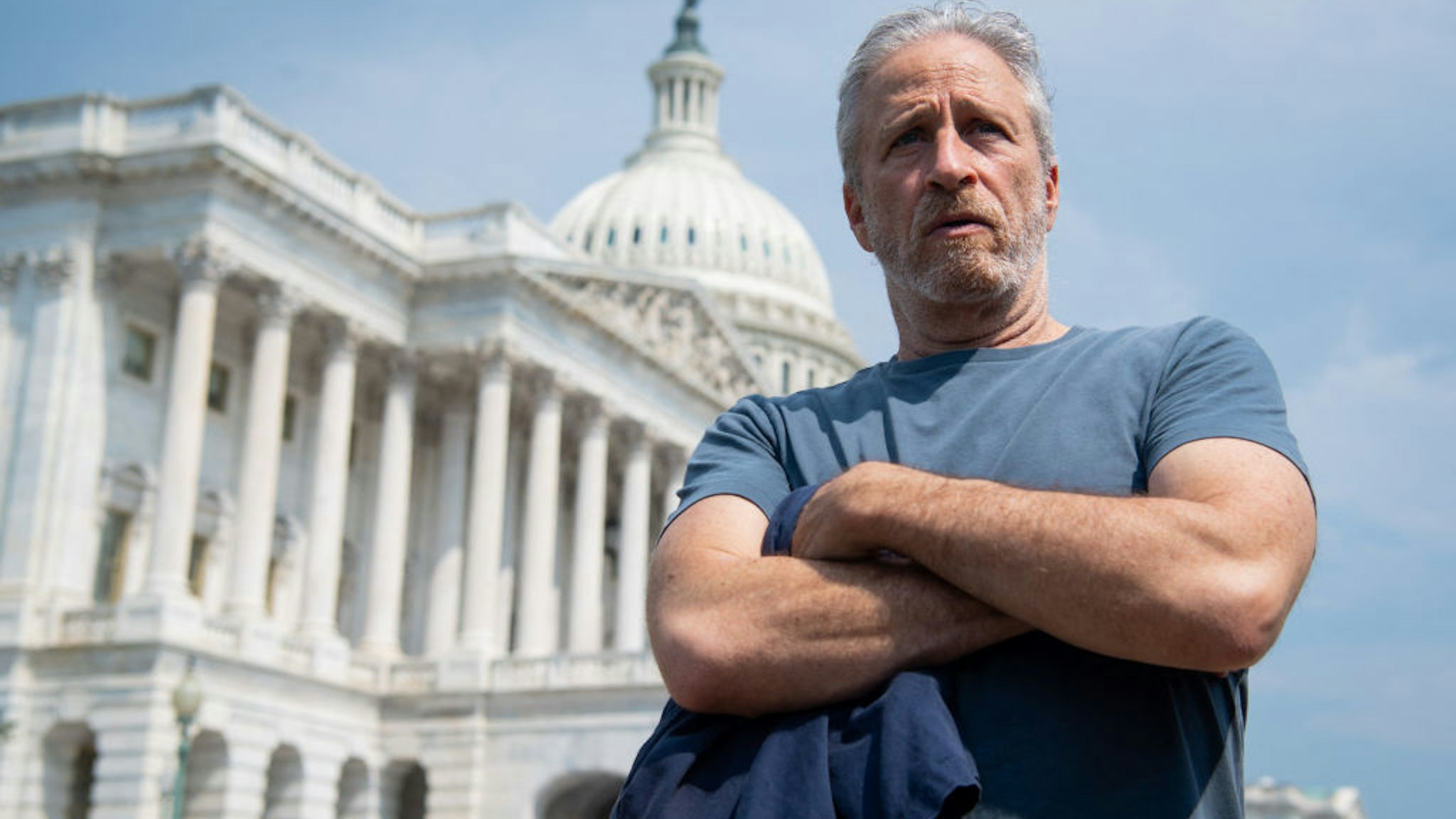 Actor and comedian Jon Stewart attends a press conference by members of the US House unveiling the "Honoring our Promise to Address Comprehensive Toxics Act of 2021's legislation, dealing with the effects caused by exposure to toxic substances during military service by veterans, outside the US Capitol in Washington, DC, May 26, 2021. (Photo by SAUL LOEB / AFP) (Photo by