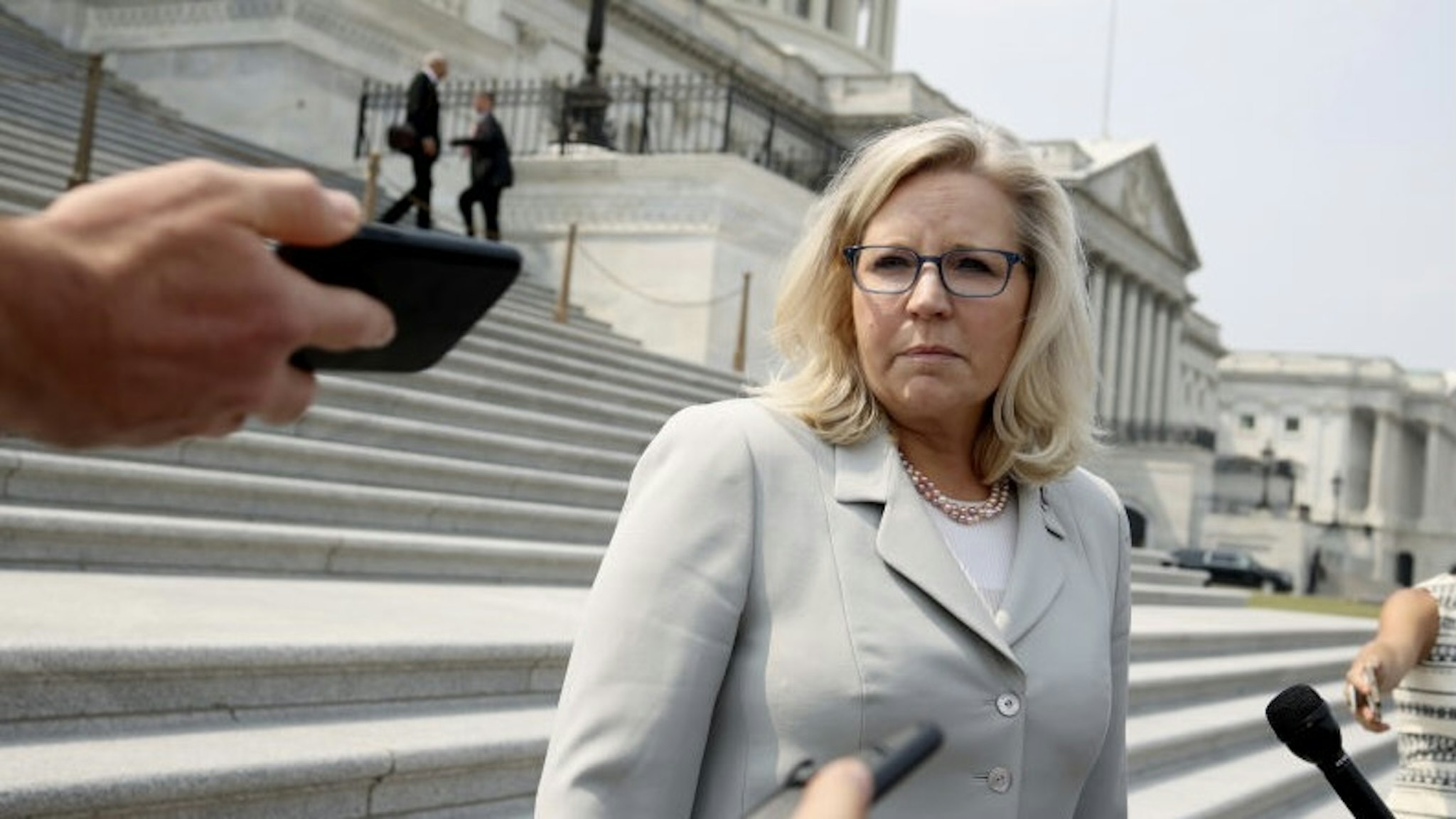 Liz Cheney Speaks To Press On Capitol Hill WASHINGTON, DC - JULY 21: U.S. Rep. Liz Cheney (R-WY) speaks to reporters outside of the U.S. Capitol on July 21, 2021 in Washington, DC. Cheney expressed her intention to stay on the committee investigating the January 6th riots after the decision by Speaker of the House Nancy Pelosi (D-CA) to reject two of House Minority Leader McCarthy's picks for the committee. (Photo by Anna Moneymaker/Getty Images) Anna Moneymaker / Staff via Getty Images