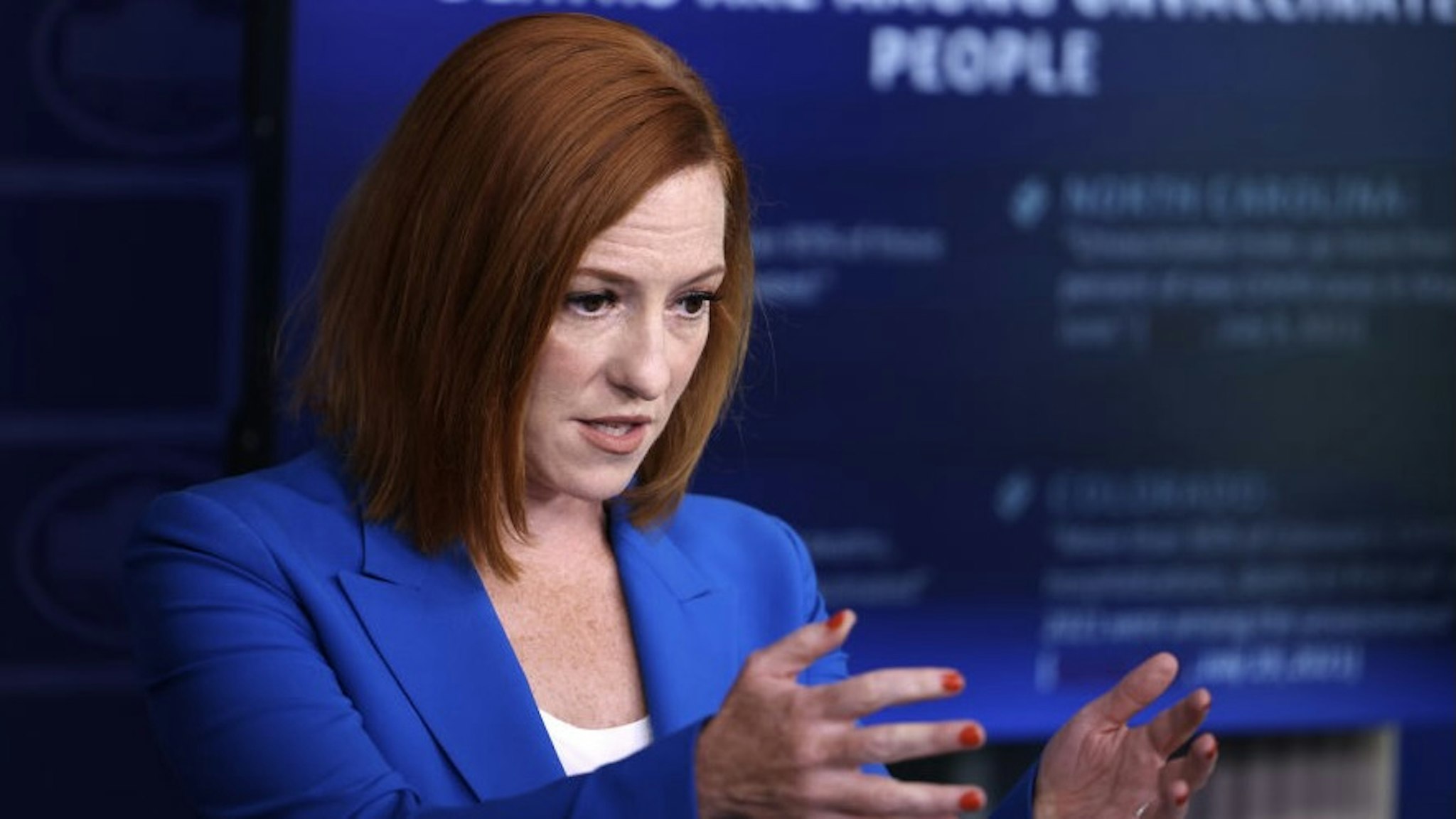 Jen Psaki Holds Daily White House Press Briefing WASHINGTON, DC - JULY 27: White House Press Secretary Jen Psaki gestures as she speaks at a daily press briefing in the James Brady Press Briefing Room of the White House on July 27, 2021 in Washington, DC. Psaki fielded questions from reporters on the potential updated CDC guidance on indoor mask-wearing for those vaccinated against COVID-19. (Photo by Anna Moneymaker/Getty Images) Anna Moneymaker / Staff via Getty Images