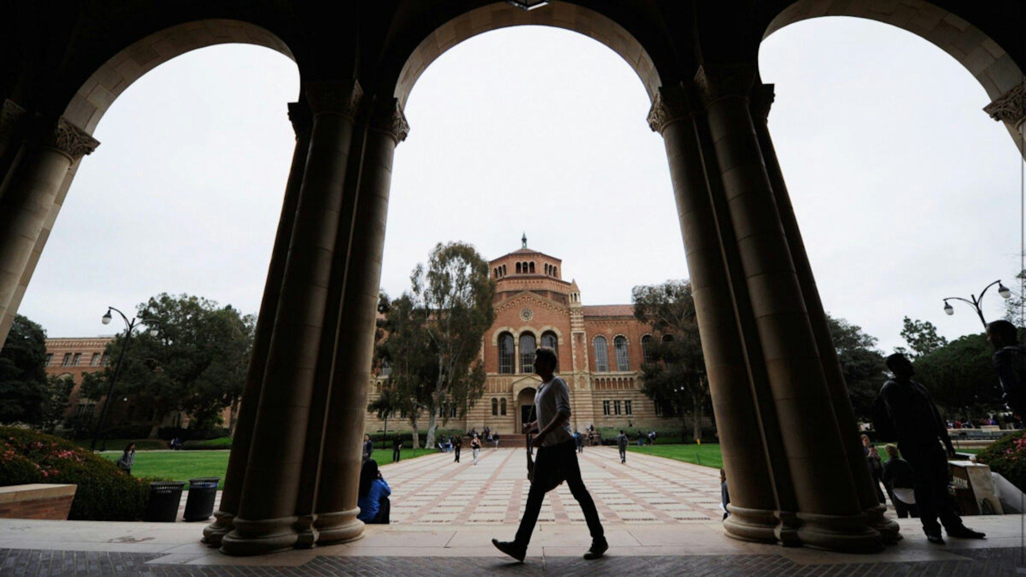 A student walks near Royce Hall on the campus of UCLA on April 23, 2012 in Los Angeles, California.