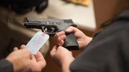 Handgun Customers shop for a handgun at Metro Shooting Supplies on November 12, 2014 in Bridgeton, Missouri.
