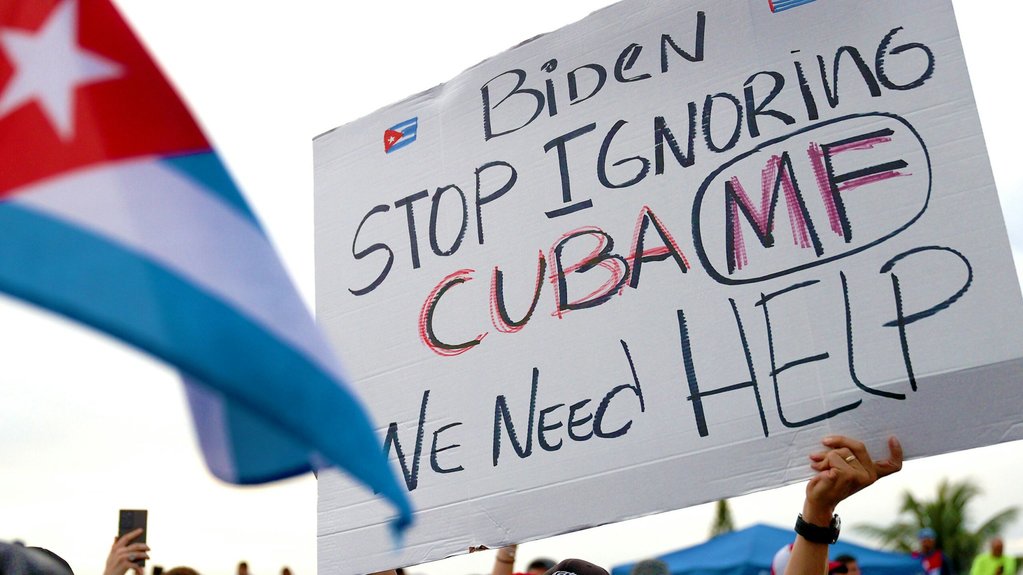 MIAMI, FLORIDA - JULY 13: Protesters shut down part of the Palmetto Expressway as they show their support for the people in Cuba that have taken to the streets to protest on July 13, 2021 in Miami, Florida. On Sunday, thousands of Cubans took to the streets across the country to protest pandemic restrictions, the pace of Covid-19 vaccinations and the Cuban government.