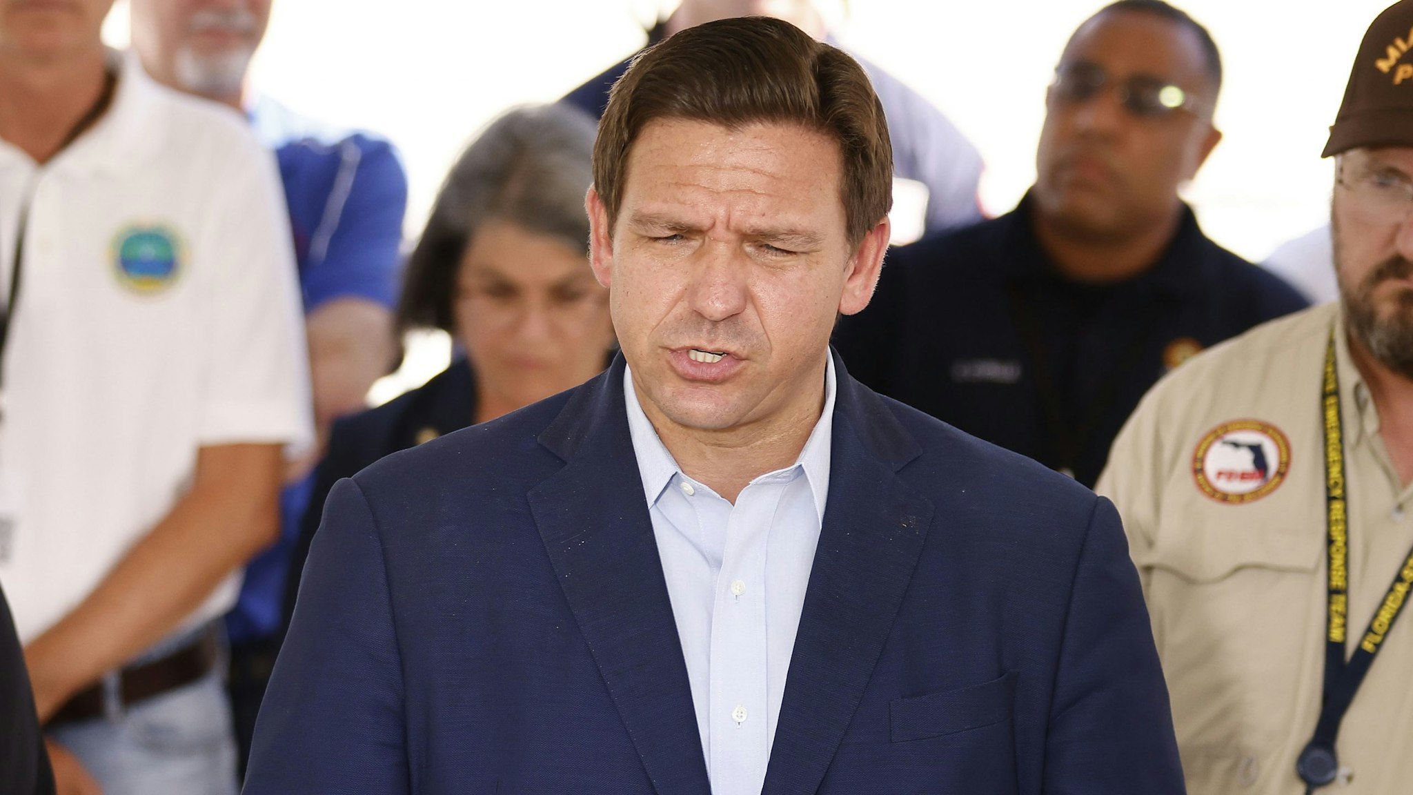 SURFSIDE, FLORIDA - JULY 03: Florida Gov. Ron DeSantis speaks to the media about the 12-story Champlain Towers South condo building that partially collapsed on July 03, 2021 in Surfside, Florida. Over one hundred people are being reported as missing as the search-and-rescue effort continues.
