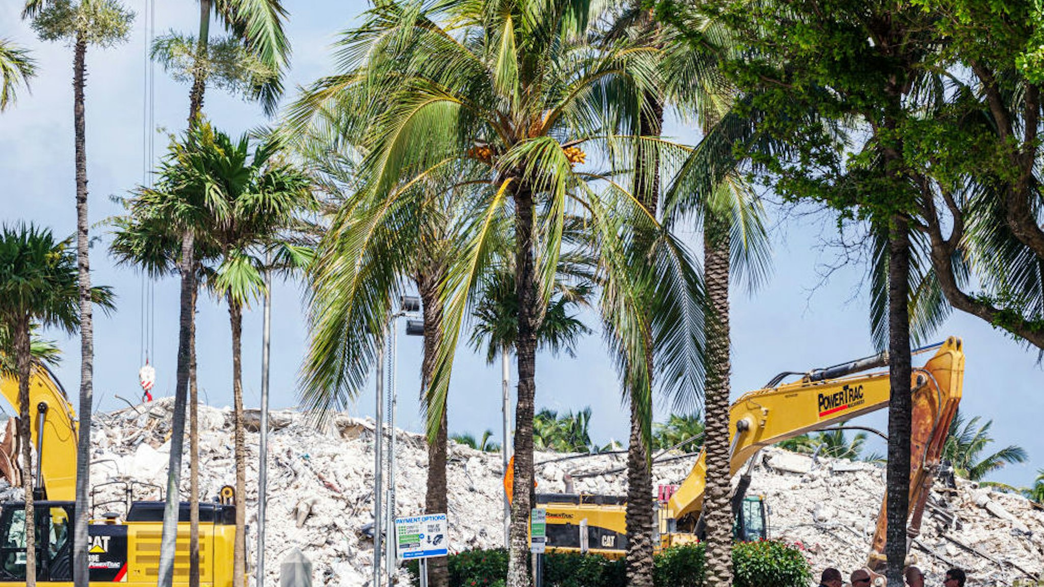 Florida, Miami, Surfside Building Collapse, pile of debris with heavy equipment to help remove