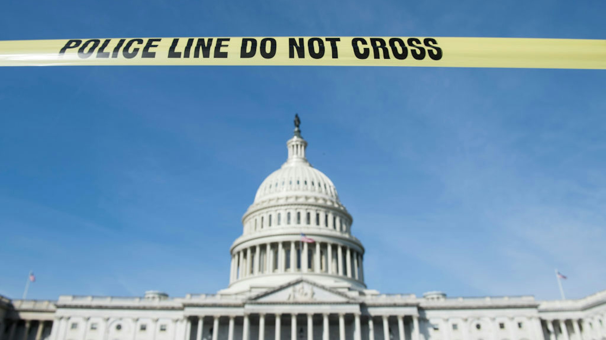 UNITED STATES - MARCH 13: Yellow police tape on the East Plaza with the Capitol dome in the backrground on Wednesday, March 13, 2019.