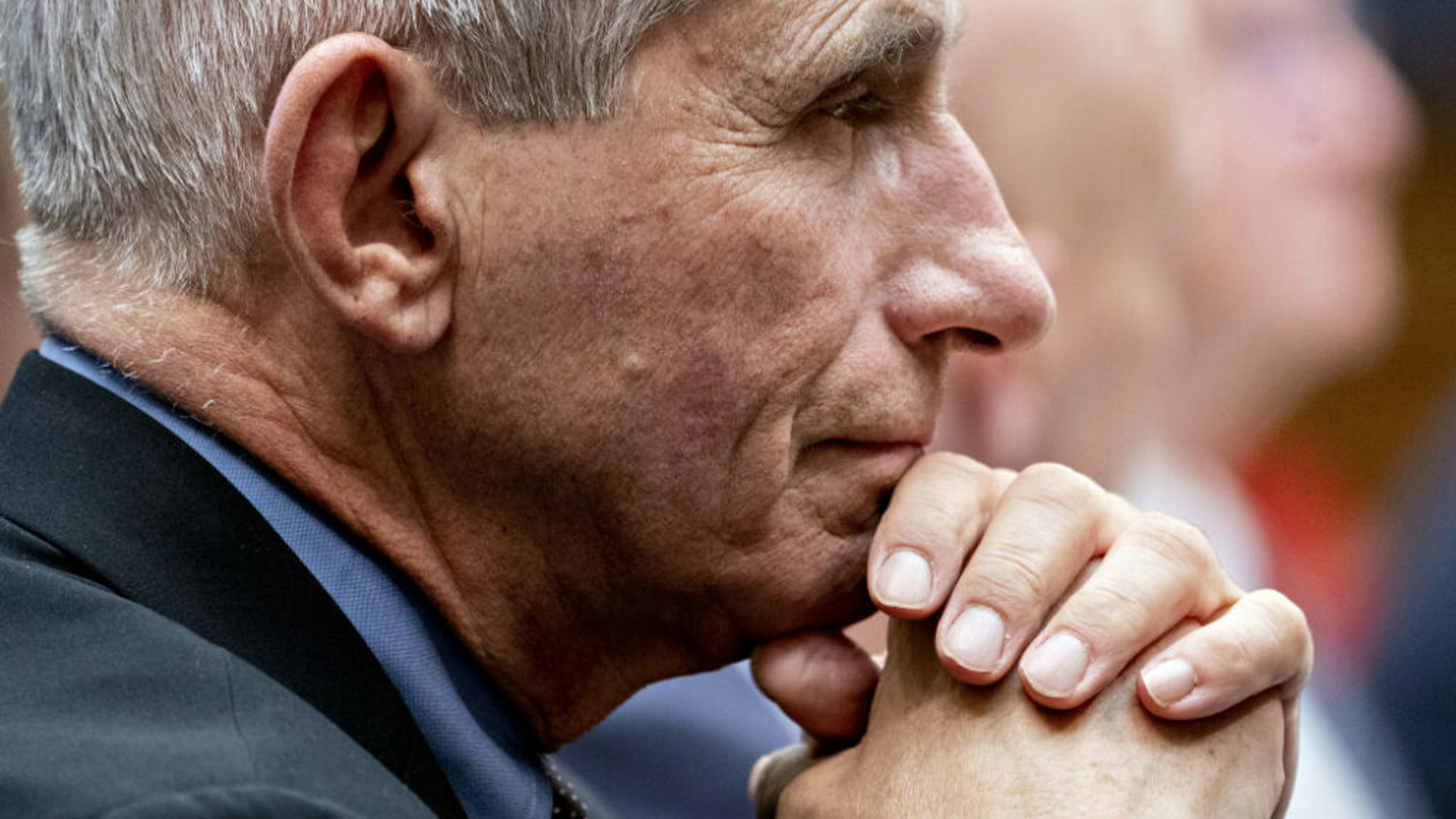 Anthony Fauci, director of the National Institute of Allergy and Infectious Diseases, listens during a House Energy and Commerce Subcommittee on Health hearing in Washington, D.C., U.S., on Wednesday, Feb. 26, 2020. Top U.S. health officials described a range of measures the government could take if the outbreak of coronavirus that began in China spreads widely in the U.S., outlining emergency plans that could result in significant disruptions to daily life for some.