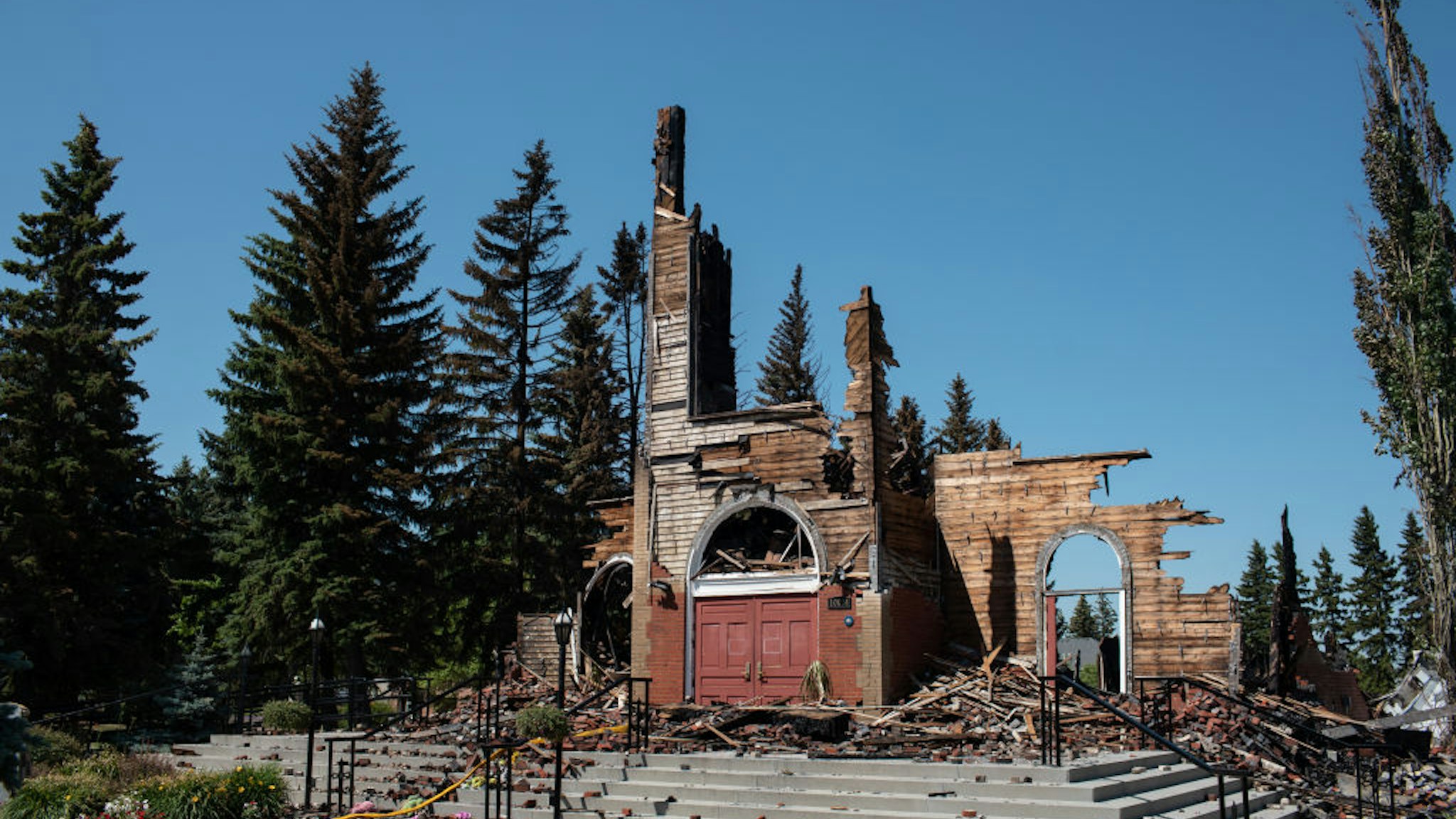 ALBERTA, CANADA - JULY 01: A view of the Roman Catholic St. Jean Baptiste church destroyed by fire in Morinville, Alberta on Thursday, July 1, 2021.