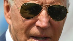 Joe Biden US President Joe Biden makes his way to board Air Force One before departing from Andrews Air Force Base in Maryland on July 9, 2021. - Biden is heading to Wilmington, Delaware to spend the weekend at his residence.