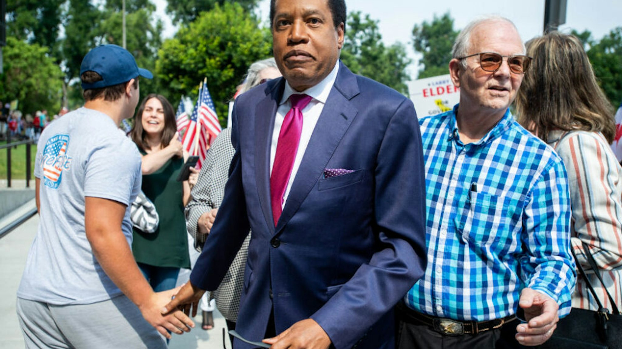 Norwalk, CA - July 13:Larry Elder arrives at the Norwalk Registrar of Voters on Tuesday, July 13, 2021 to file paperwork announcing his run for governor in the California recall election.