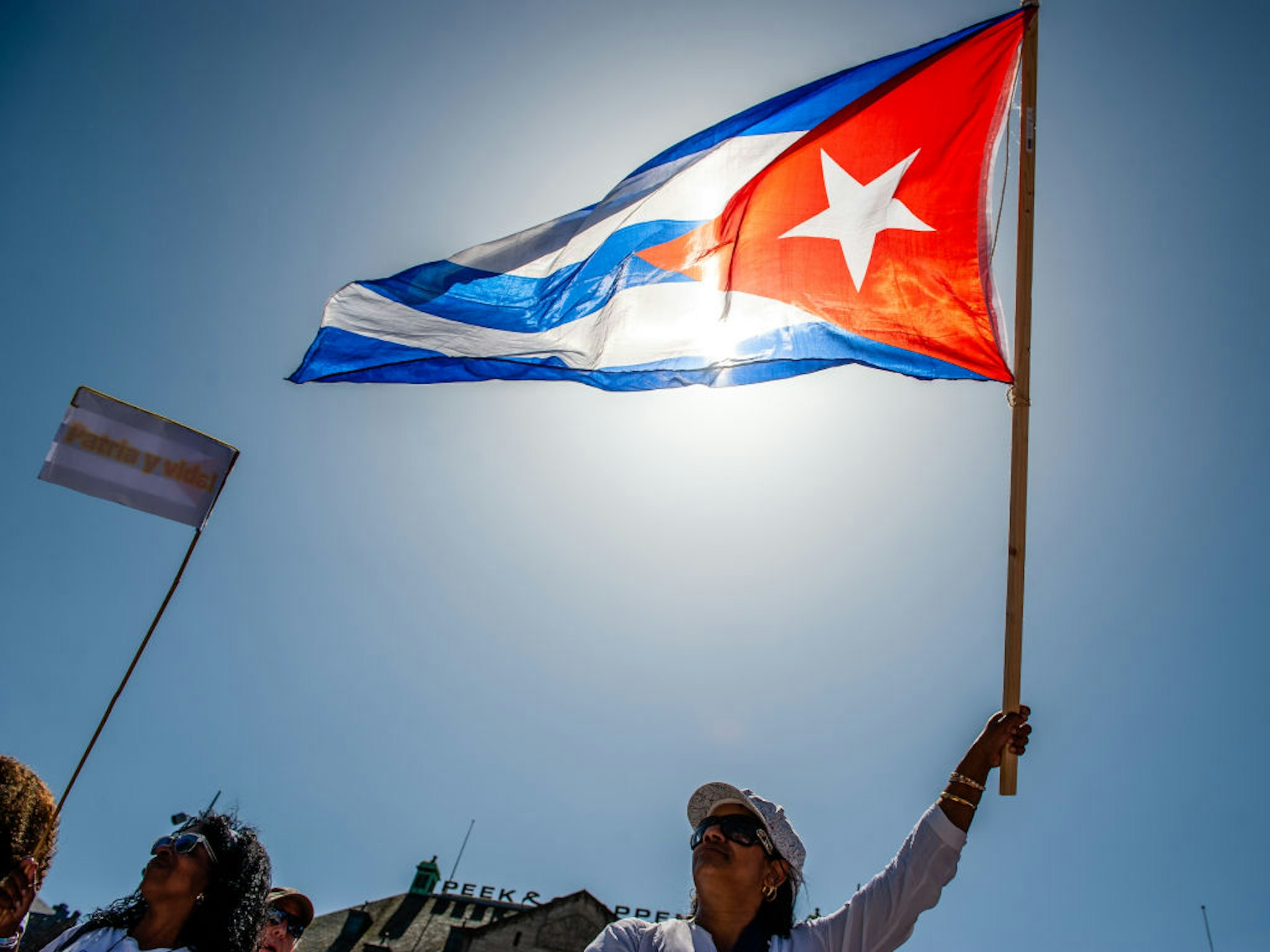AMSTERDAM, NETHERLANDS - 2021/07/17: A protester holds a Cuban flag during the demonstration.