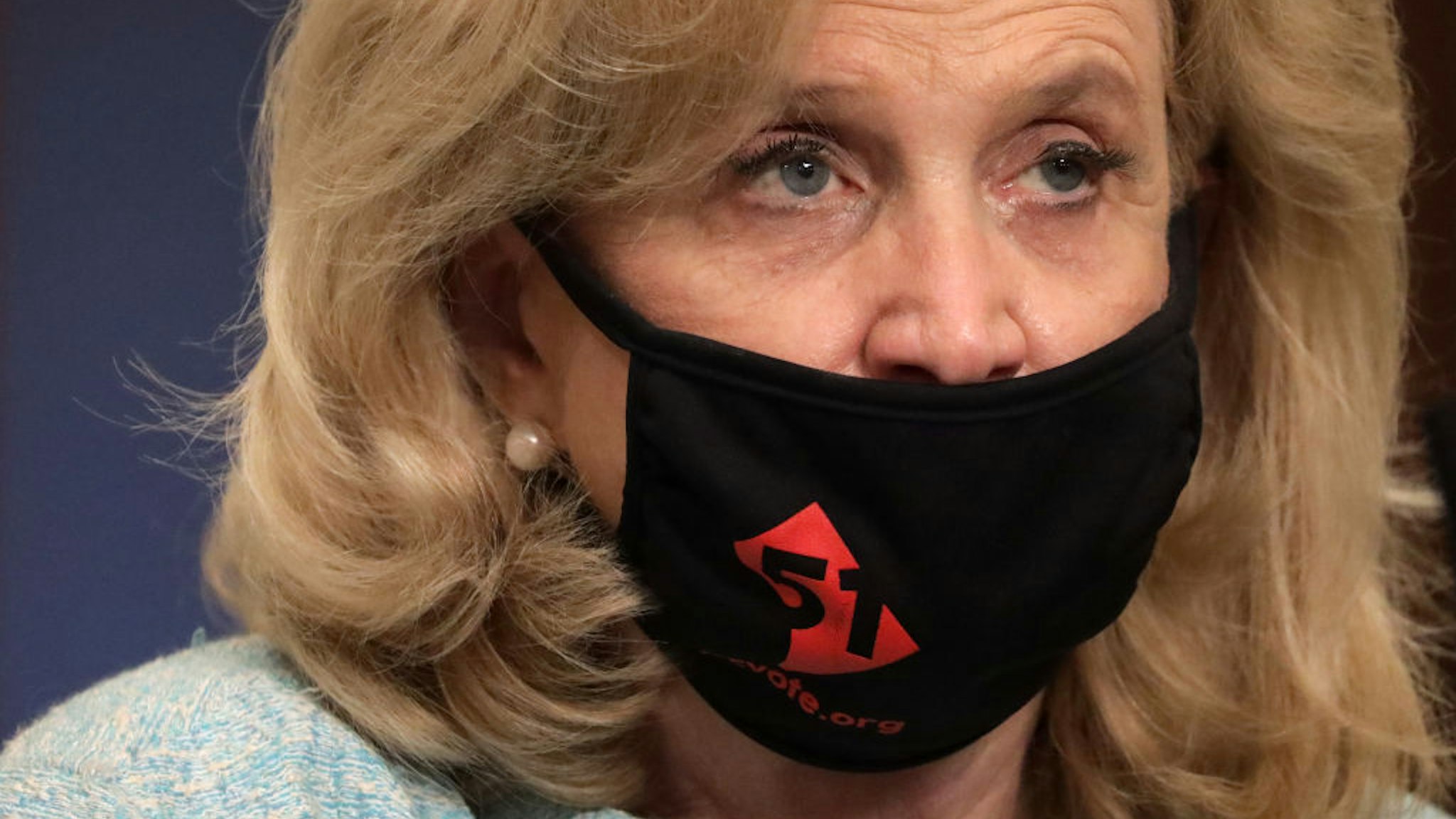 U.S. Rep. Carolyn Maloney (D-NY) wears a DC Vote mask as she waits for the beginning of a hearing before the Coronavirus Crisis Subcommittee of House Oversight and Reform Committee June 26, 2020 on Capitol Hill in Washington, DC.