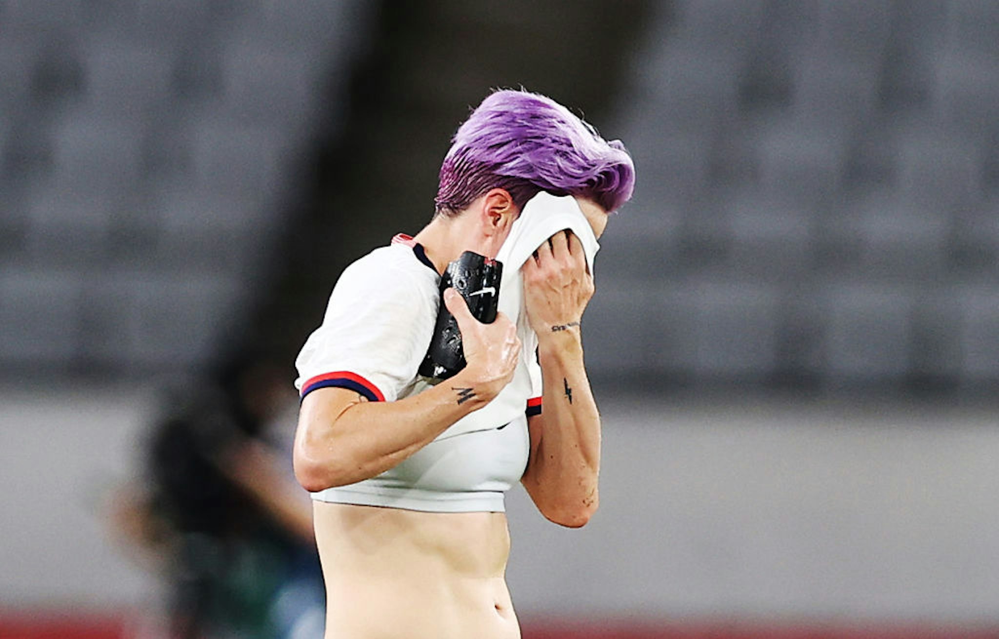 Megan Rapinoe of United States reacts in the Women's First Round Group G match between Sweden and United States during the Tokyo 2020 Olympic Games at Tokyo Stadium on July 21, 2021 in Chofu, Tokyo, Japan.