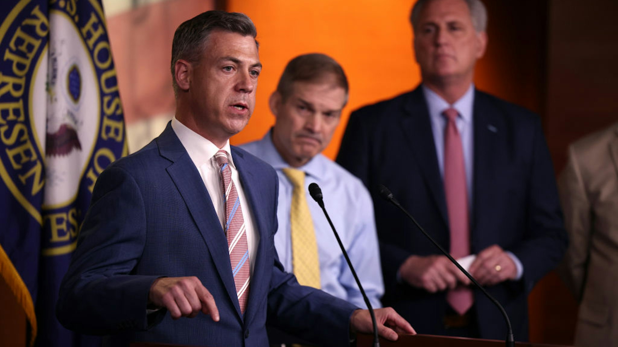 WASHINGTON, DC - JULY 21: Rep. Jim Banks (R-IN) (L), joined by Rep. Jim Jordan (R-ON) (C) and House Minority Leader Kevin McCarthy (R-CA) speaks at a news conference on House Speaker Nancy Pelosi’s decision to reject two of Leader McCarthy’s selected members from serving on the committee investigating the January 6th riots on July 21, 2021 in Washington, DC. Speaker Pelosi announced she would be rejecting Rep. Banks and Rep. Jordan’s assignment to the committee. (Photo by Kevin Dietsch/Getty Images)