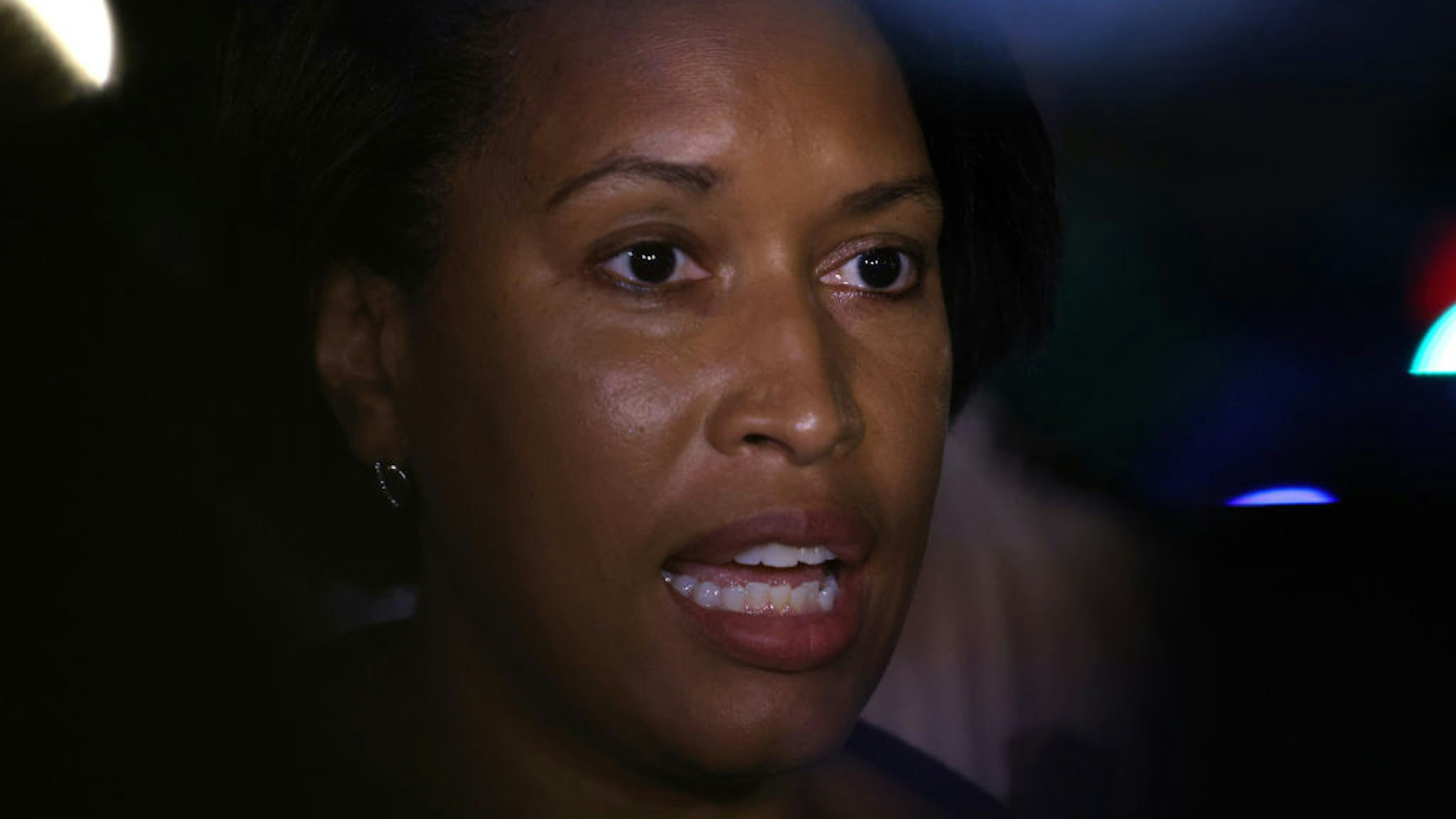 Mayor Muriel Bowser speaks to reporters after a shooting on July 22, 2021 in Washington, DC. Gunfire erupted on a busy street, injuring two and sending others fleeing for safety.