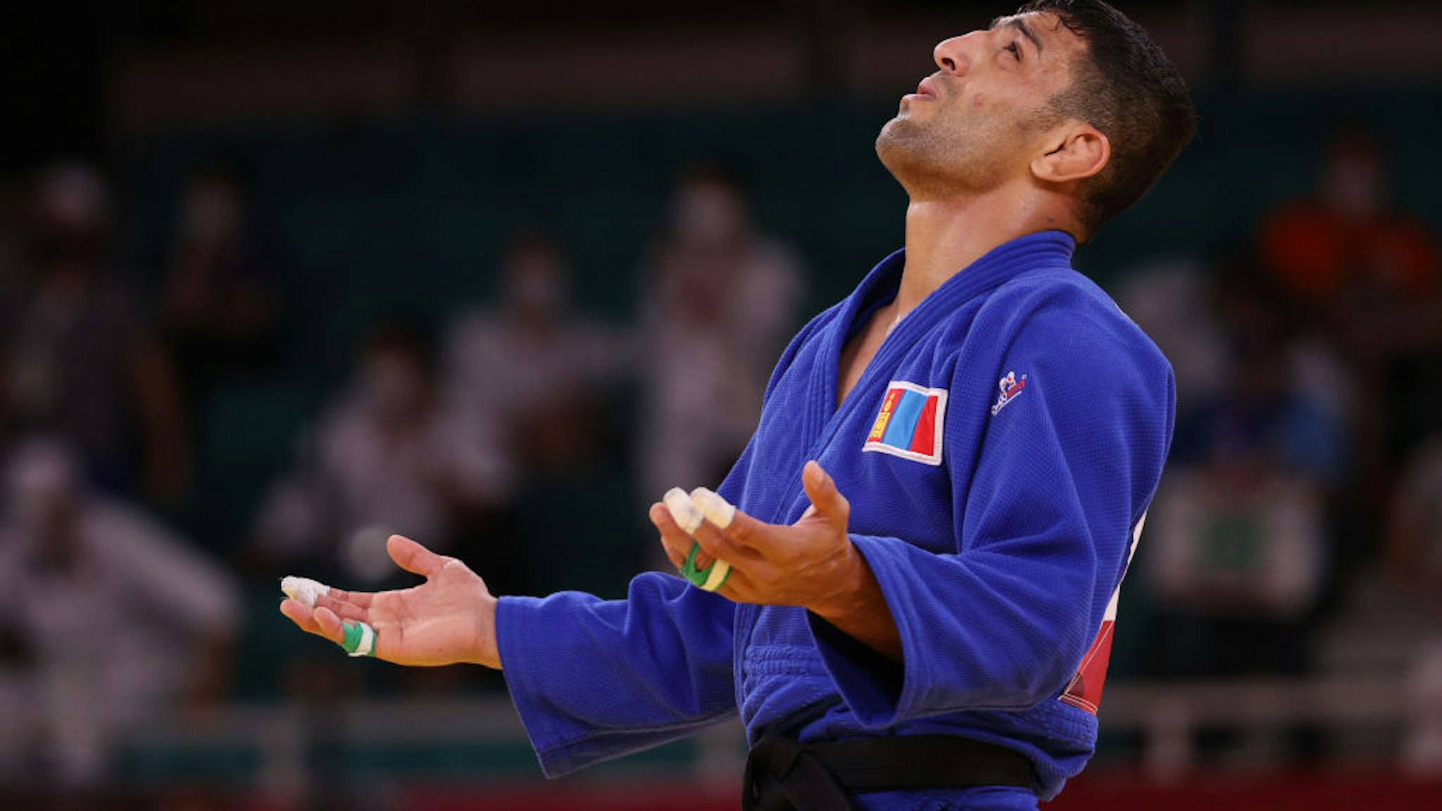 TOKYO, JAPAN - JULY 27: Saeid Mollaei of Team Mongolia reacts after he defeated Shamil Borchashvili of Team Austria during the Men’s Judo 81kg Semifinal of Table B on day four of the Tokyo 2020 Olympic Games at Nippon Budokan on July 27, 2021 in Tokyo, Japan. (Photo by Harry How/Getty Images)