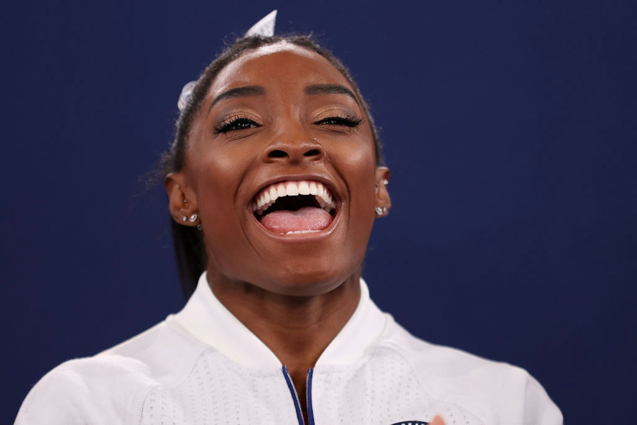 Simone Biles of Team United States reacts during the Women's Team Final on day four of the Tokyo 2020 Olympic Games at Ariake Gymnastics Centre on July 27, 2021 in Tokyo, Japan.