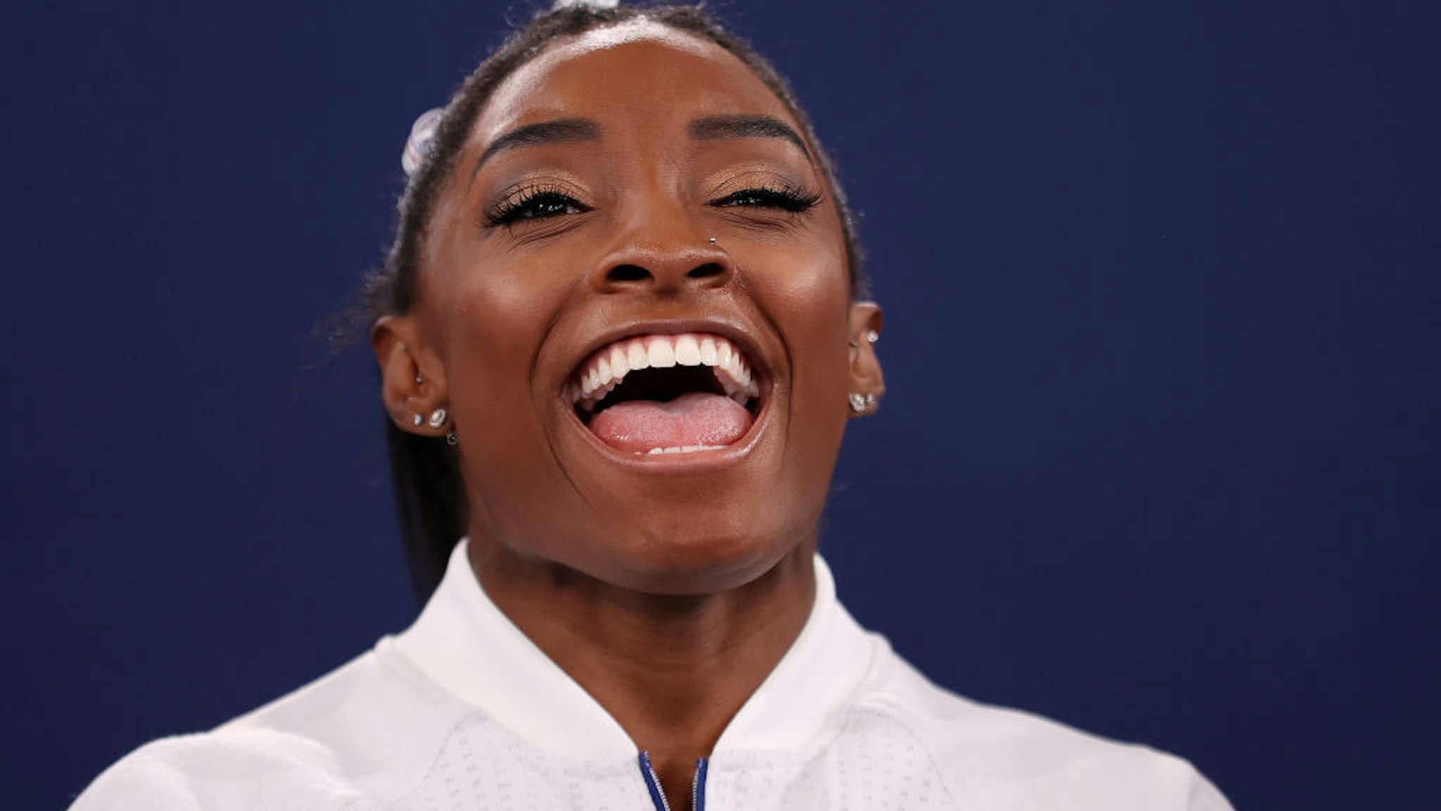 Simone Biles of Team United States reacts during the Women's Team Final on day four of the Tokyo 2020 Olympic Games at Ariake Gymnastics Centre on July 27, 2021 in Tokyo, Japan.