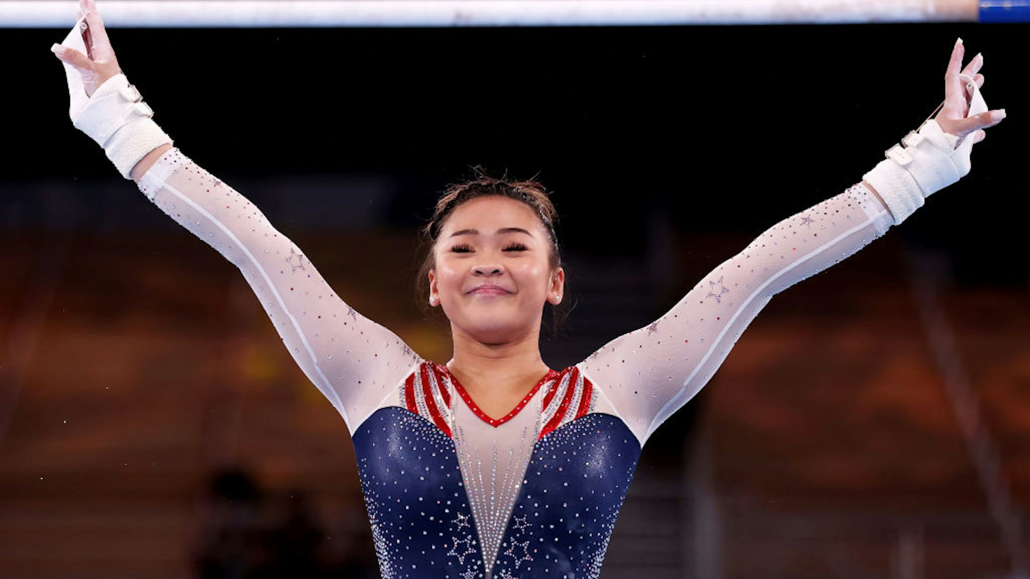 Sunisa Lee of Team United States reacts after competing on uneven bars during the Women's All-Around Final on day six of the Tokyo 2020 Olympic Games at Ariake Gymnastics Centre on July 29, 2021 in Tokyo, Japan.