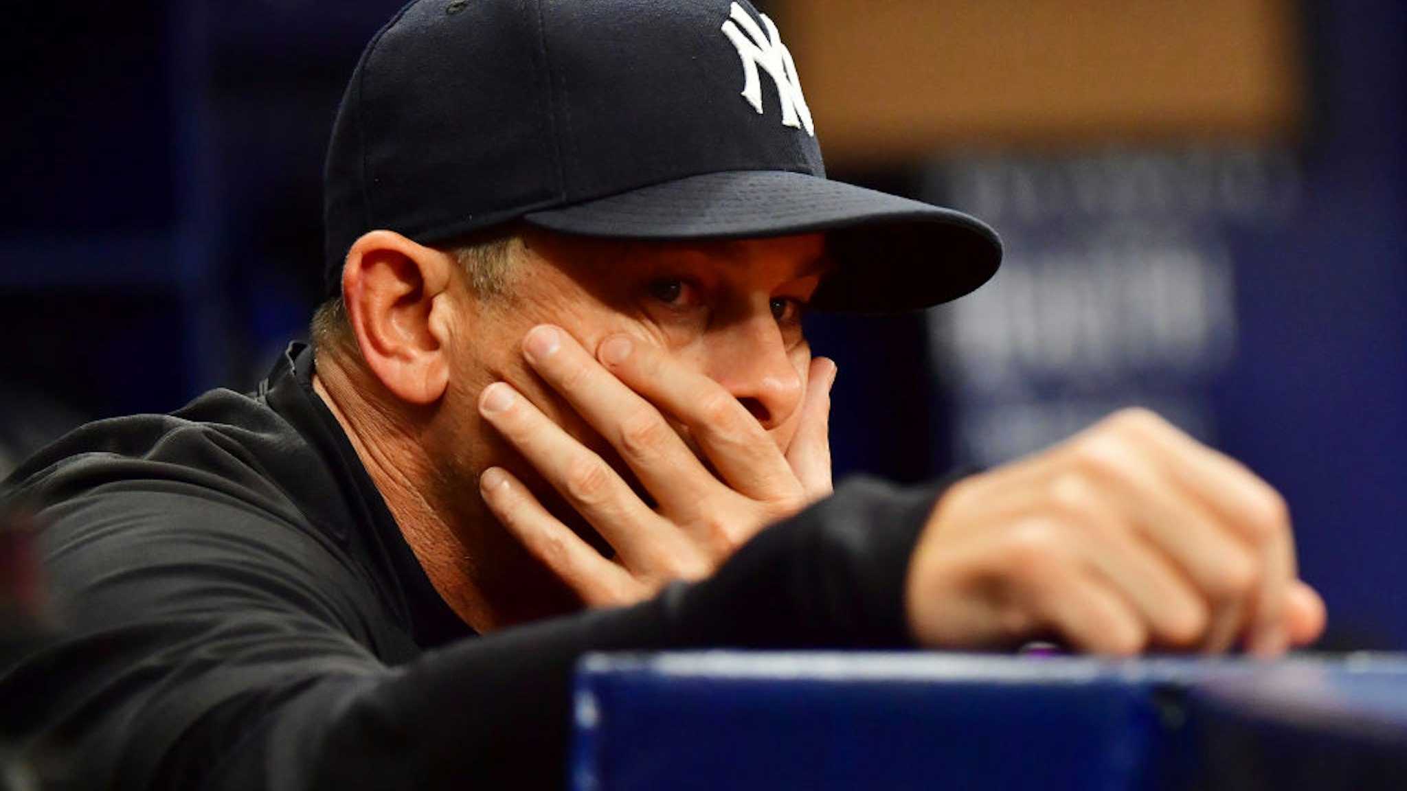 ST PETERSBURG, FLORIDA - JULY 29: Manager Aaron Boone #17 of the New York Yankees looks on during the ninth inning against the Tampa Bay Rays at Tropicana Field on July 29, 2021 in St Petersburg, Florida. (Photo by Julio Aguilar/Getty Images)