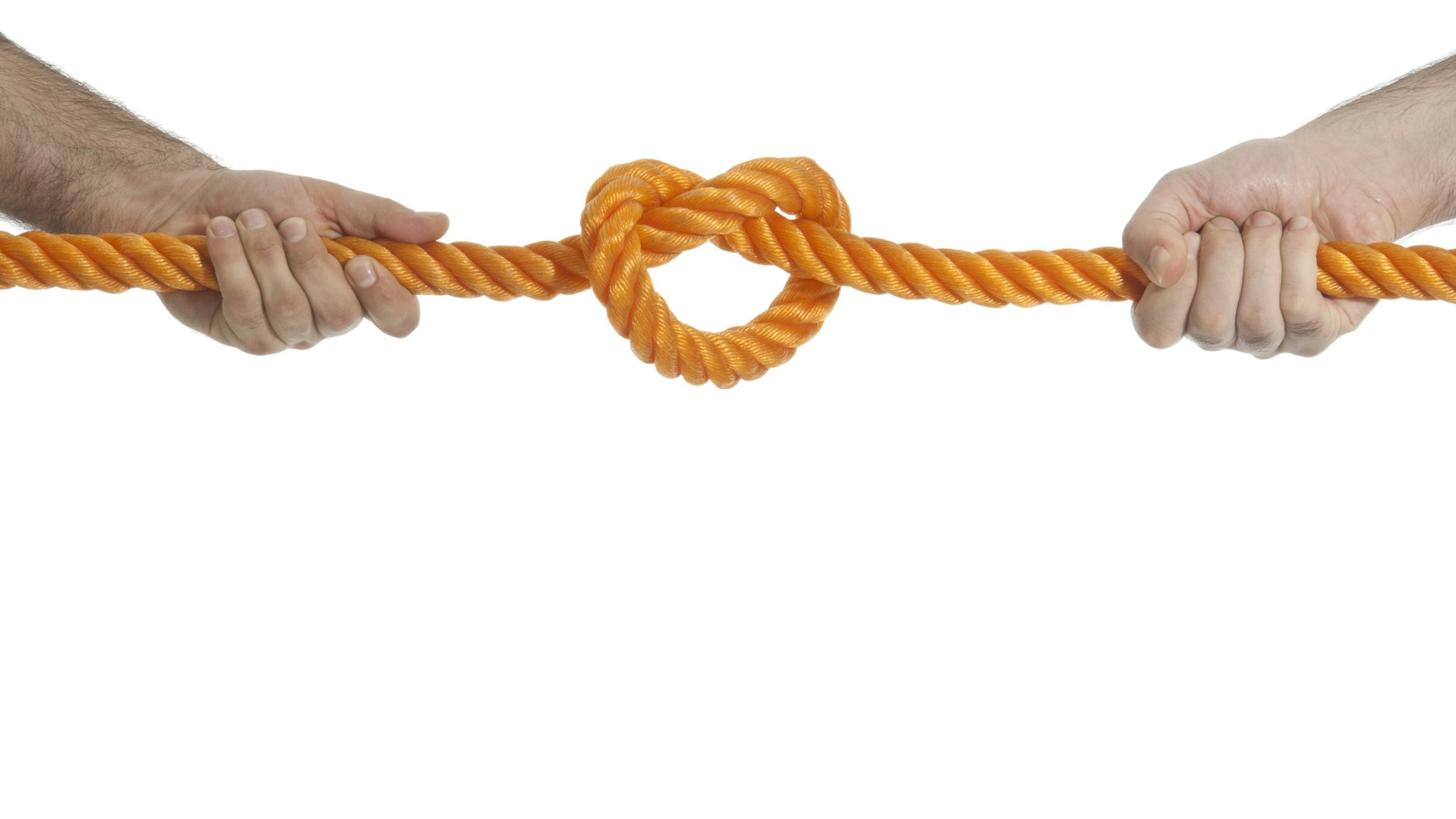 Two hands pulling a rope in opposite direction