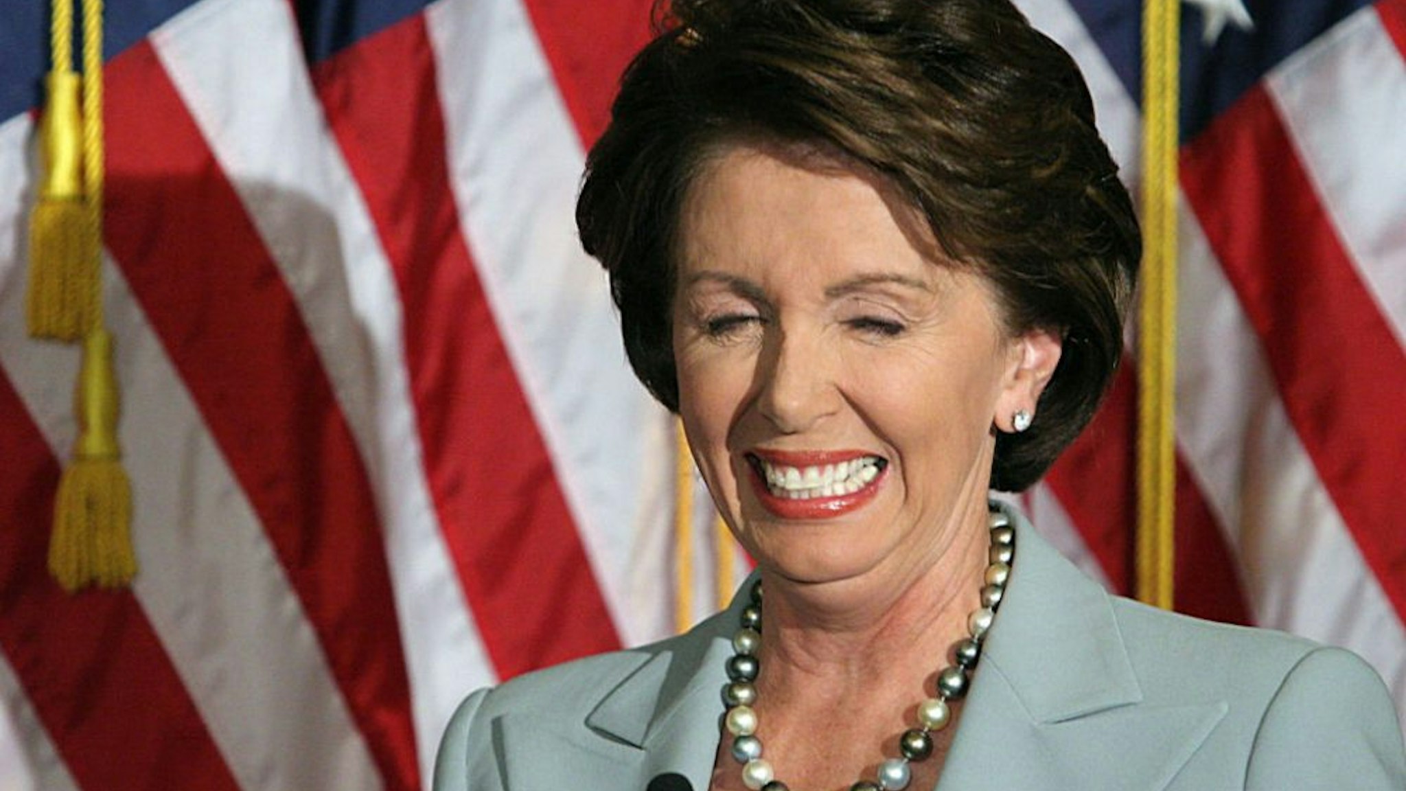 Democratic House leader Nancy Pelosi laughs at a question during a press conference 08 November 2006 on Capitol Hill in Washington, DC. Pelosi is set to become the first female speaker of the US House of Representatives following the 07 November elections. She has called for the resignation of US Secretary of Defense Donald Rumsfeld which was announced 08 November by US President George W. Bush.