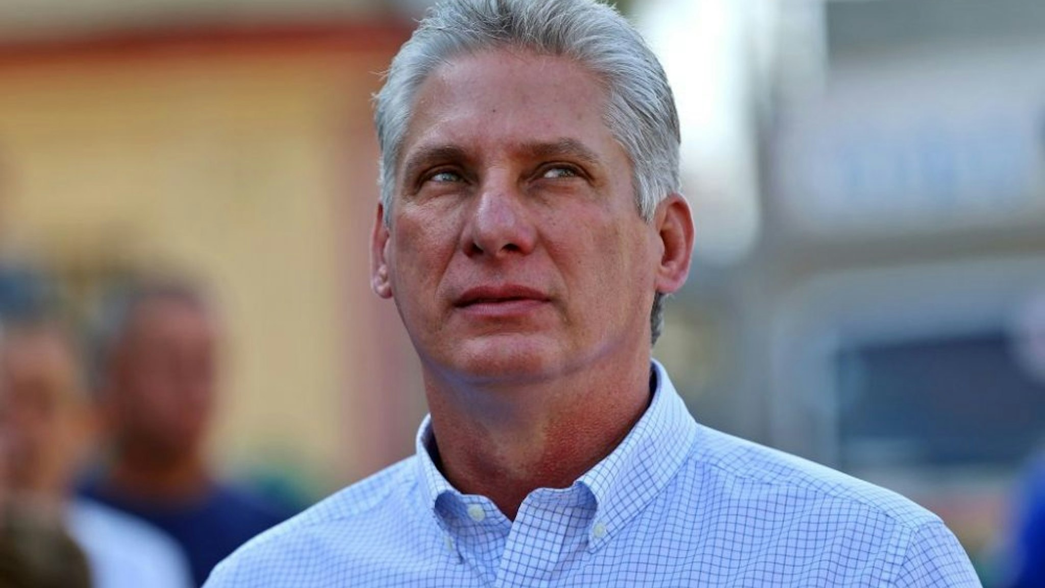 Cuba's First Vice-President Miguel Diaz-Canel queues at a polling station in Santa Clara, Cuba, during an election to ratify a new National Assembly, on March 11, 2018. - Cubans vote to ratify a new National Assembly on Sunday, a key step in a process leading to the election of a new president, the first in nearly 60 years from outside the Castro family. The new members of the National Assembly will be tasked with choosing a successor to 86-year-old President Raul Castro when he steps down next month.