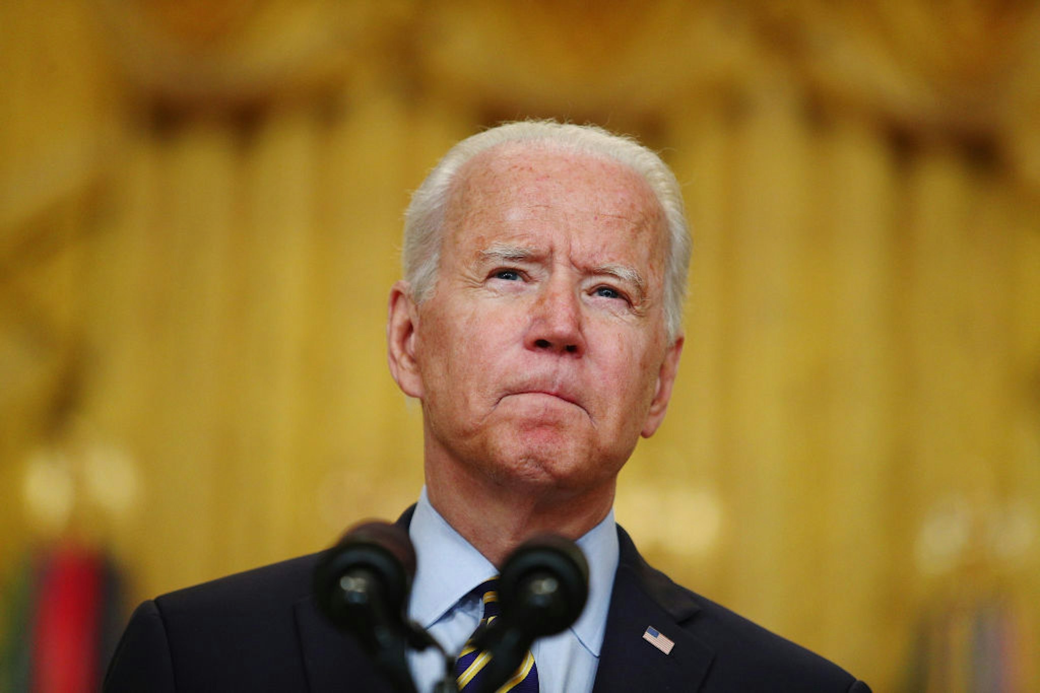U.S. President Joe Biden pauses while speaking in the East Room of the White House in Washington, D.C., U.S., on Thursday, July 8, 2021. Biden met with security advisers before delivering remarks about the U.S. troop drawdown from Afghanistan, where the Taliban is rapidly advancing on the heels of the U.S. departure. Photographer: Tom Brenner/Bloomberg via Getty Images