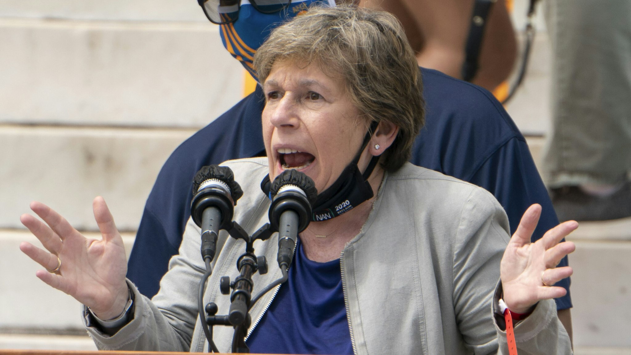 Randi Weingarten, president of American Federation of Teachers, speaks, along with Everett Kelley, left, National President of the American Federation of Government Employees, during the "Commitment March: Get Your Knee Off Our Necks" protest against racism and police brutality, on August 28, 2020, in Washington, DC. - Anti-racism protesters marched on the streets of the US capital on Friday, after a white officer's shooting of African American Jacob Blake. The protester also marked the 57th anniversary of civil rights leader Martin Luther King's historic "I Have a Dream" speech delivered at the Lincoln Memorial.