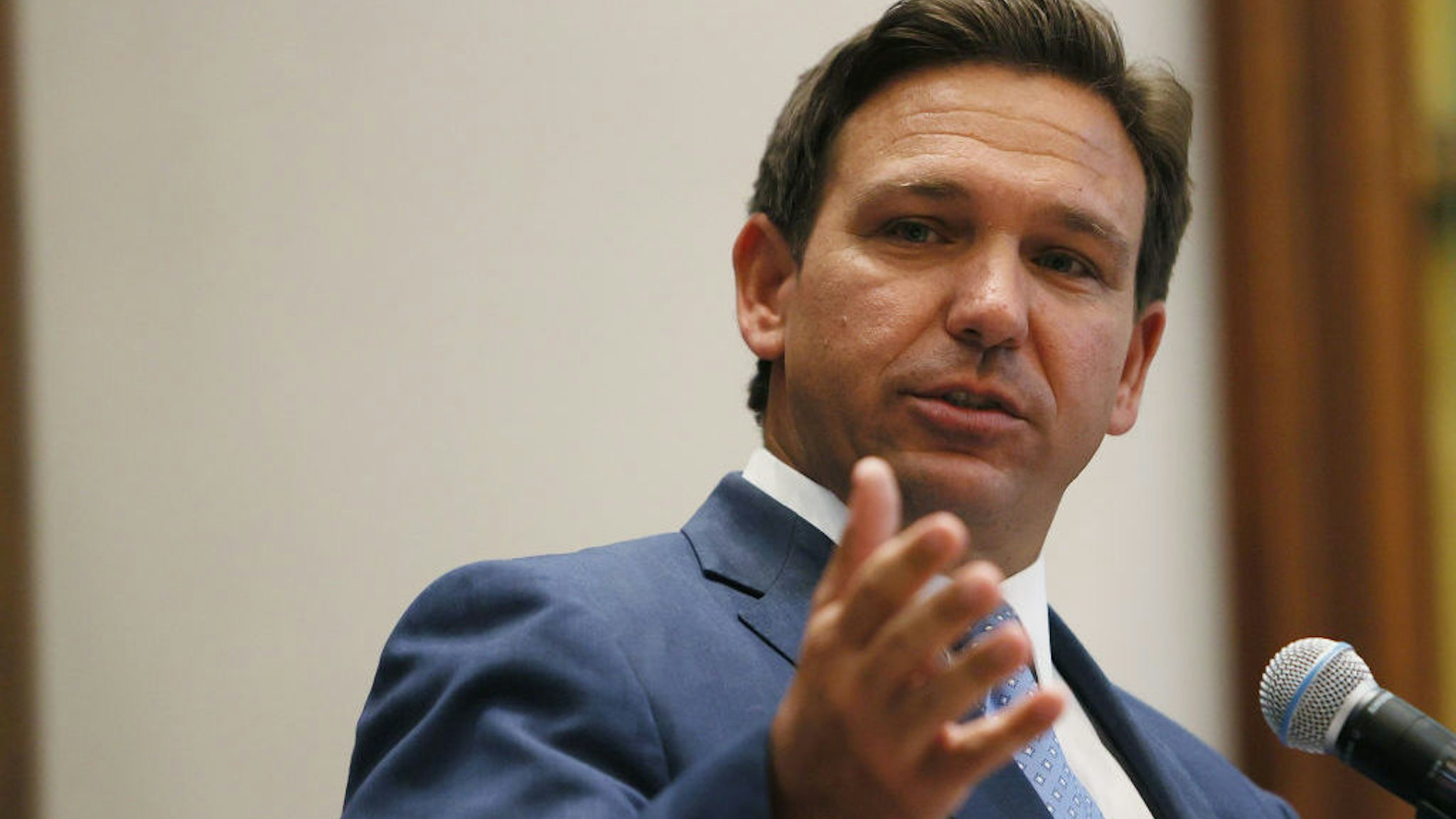SURFSIDE, FLORIDA - JUNE 14: Florida Gov. Ron DeSantis speaks during a press conference at the Shul of Bal Harbour on June 14, 2021 in Surfside, Florida. The governor spoke about the two bills he signed HB 529 and HB 805. HB 805 ensures that volunteer ambulance services, including Hatzalah, can operate. HB 529 requires Florida schools to hold a daily moment of silence. (Photo by Joe Raedle/Getty Images)