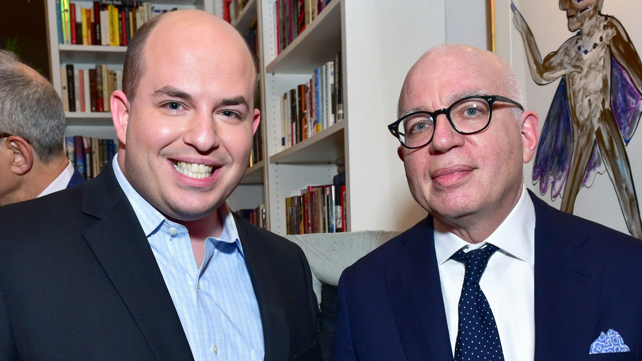 NEW YORK, NY - JANUARY 17: Brian Stelter and Author Michael Wolff attend publisher Henry Holt toasts Michael Wolff's "Fire and Fury" at Private Residence on January 17, 2018 in New York City.