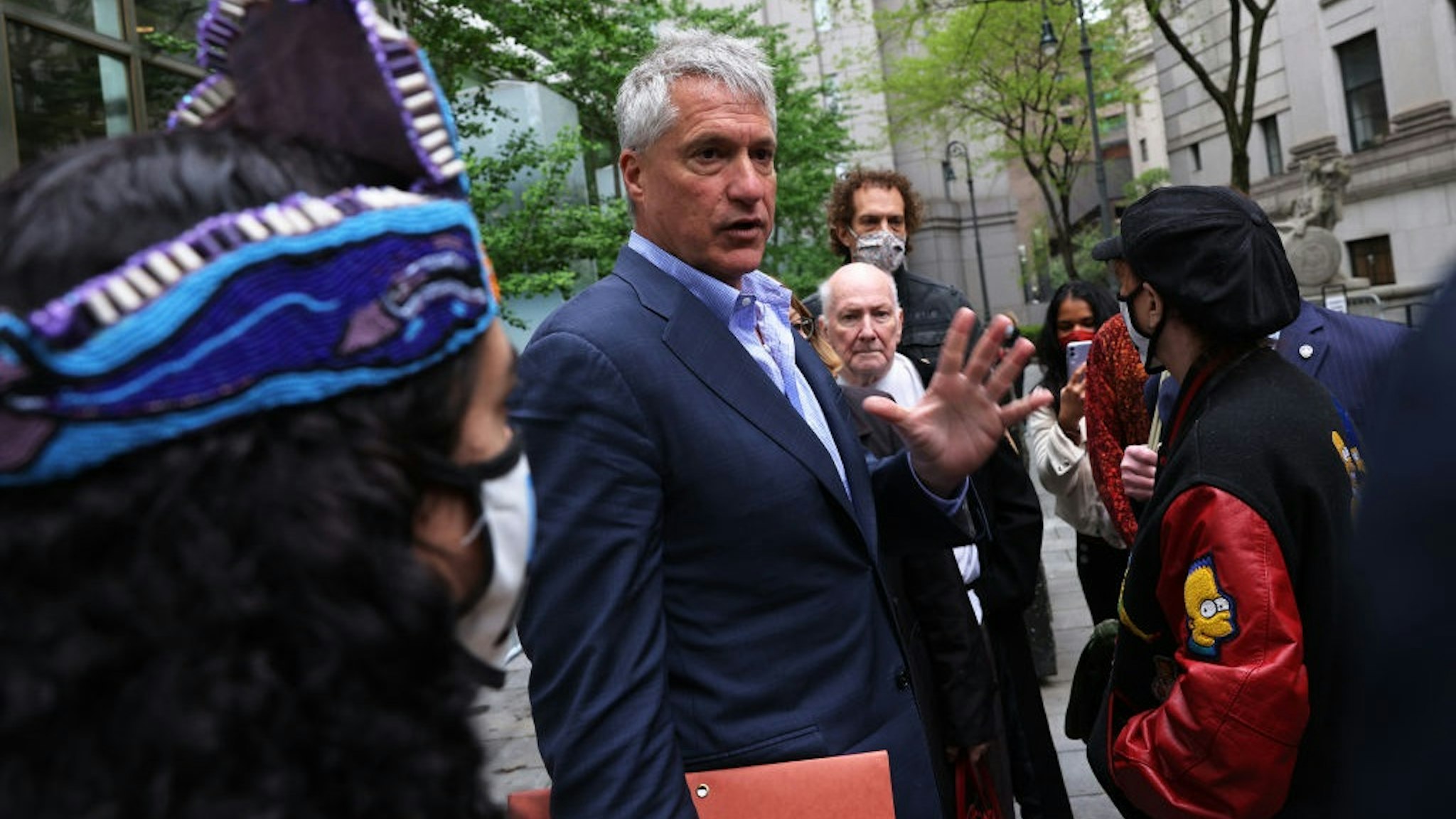 NEW YORK, NEW YORK - MAY 10: Attorney Steven Donziger speaks to his supporters as he arrives for a court appearance at Daniel Patrick Moynihan United States Courthouse in Manhattan on May 10, 2021 in New York City.