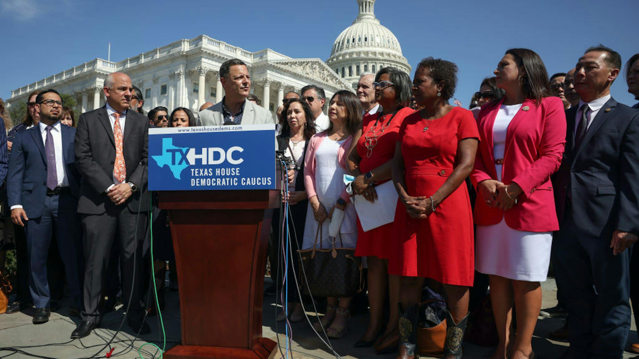 Texas Democrats WASHINGTON, DC - JULY 13: Joined by fellow state House Democrats, Chairman of the Mexican American Legislative Caucus Rep. Rafael Anchia (TX-103) speaks during a news conference on voting rights outside the U.S. Capitol on July 13, 2021 in Washington, DC. More than sixty Texas House Democrats left the state overnight to Washington, DC, in order to block a voting restrictions bill by denying a Republican quorum. Texas Governor Greg Abbott has threatened to arrest the legislators when they returns to the state. (Photo by Kevin Dietsch/Getty Images)