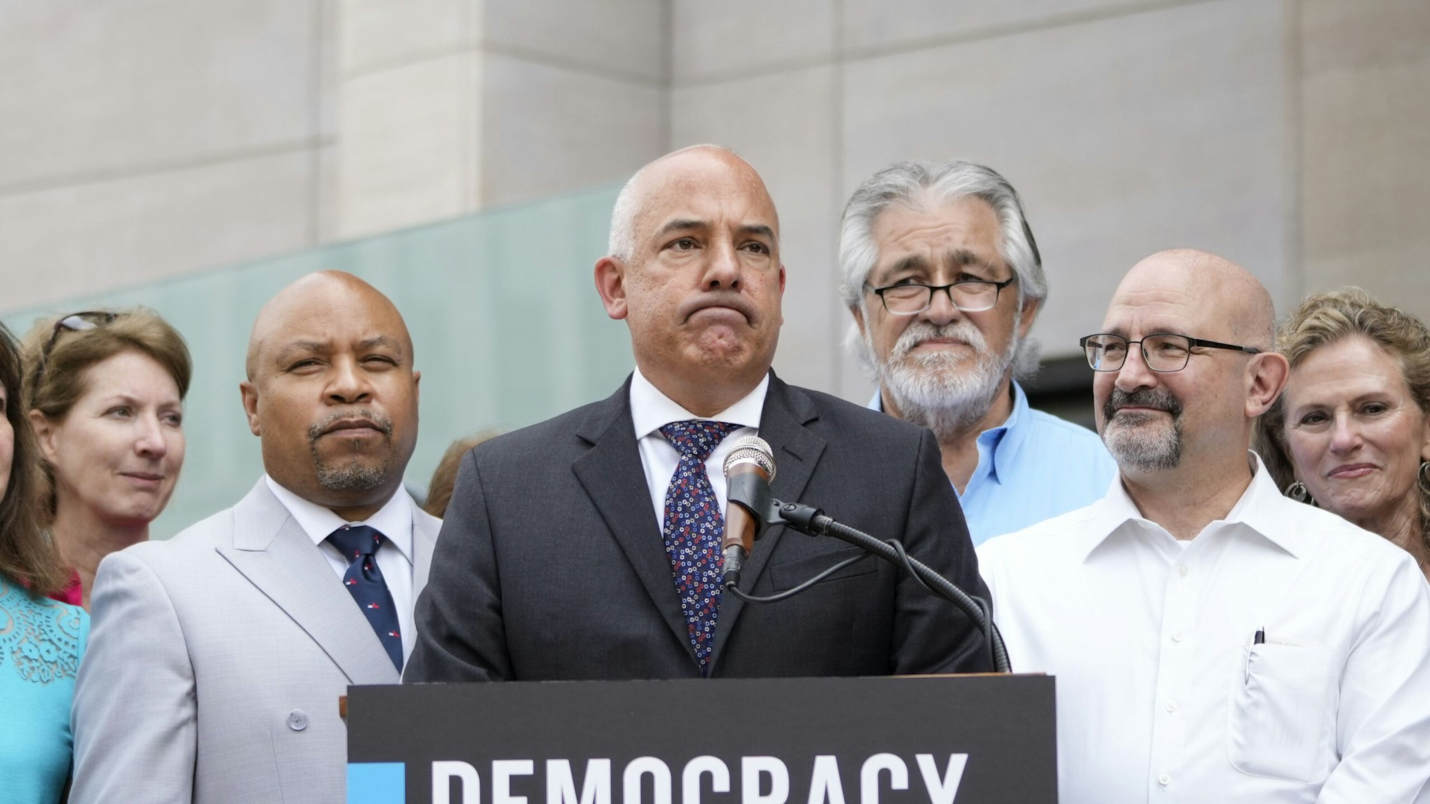 WASHINGTON, DC - JULY 15: Surrounded by Democratic members of the Texas State Legislature, Texas State Rep. Chris Turner (D-District 101), Chair of the Texas House Democratic Caucus, speaks during a news conference outside the AFL-CIO headquarters on July 15, 2021 in Washington, DC. The organized labor advocates called for the Senate to repeal the filibuster to allow passage of several bills they support, including the For The People Act and The John Lewis Voting Rights Act.