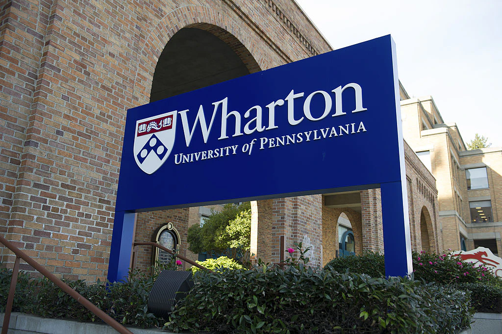 Signage for the University of Pennsylvania's Wharton School stands outside of the new campus in San Francisco, California, U.S., on Friday, Feb. 3, 2012. The University of Pennsylvania's Wharton School, the 131-year-old business school in Philadelphia, is counting on a new West Coast campus to raise its high-tech profile.