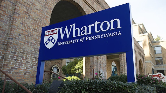Signage for the University of Pennsylvania's Wharton School stands outside of the new campus in San Francisco, California, U.S., on Friday, Feb. 3, 2012. The University of Pennsylvania's Wharton School, the 131-year-old business school in Philadelphia, is counting on a new West Coast campus to raise its high-tech profile.