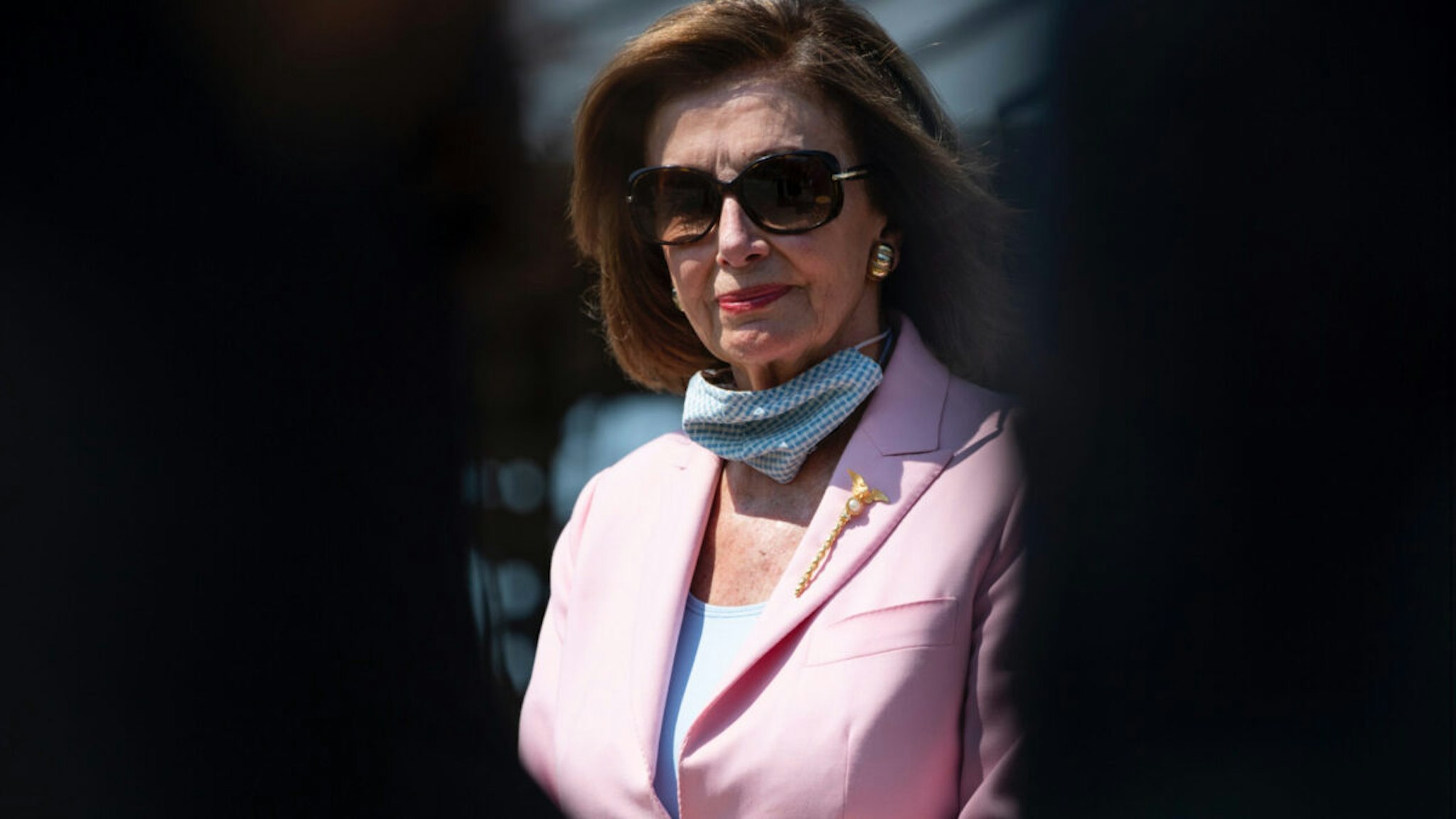 Speaker of the House Nancy Pelosi, D-Calif., is seen during a news conference with Rev. Dr. William Barber and members of the Poor People's Campaign on voting rights and infrastructure, outside the U.S. Capitol on Wednesday, August 25, 2021.
