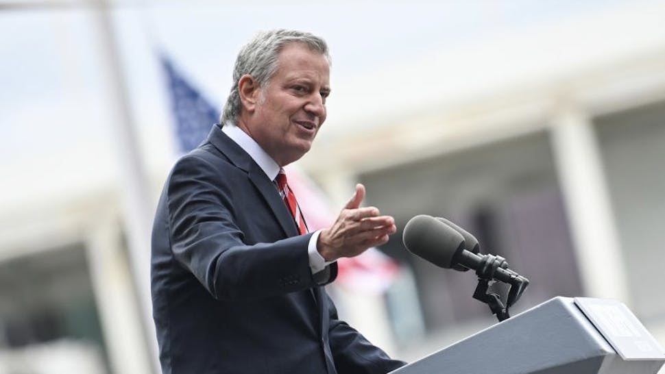 5E7A6FCB-E76A-4C29-AB7B-4E02EF75F841_1_201_a Memorial Day Weekend Celebrated In New York City NEW YORK, NEW YORK - MAY 31: Mayor Bill De Blasio speaks at the Intrepid Sea, Air & Space Museum’s annual Memorial Day Commemoration Ceremony on May 31, 2021 in New York City. The annual ceremony also commemorated those who lost their lives due to the COVID- 19 virus. (Photo by Alexi Rosenfeld/Getty Images) Alexi Rosenfeld / Contributor via Getty Images