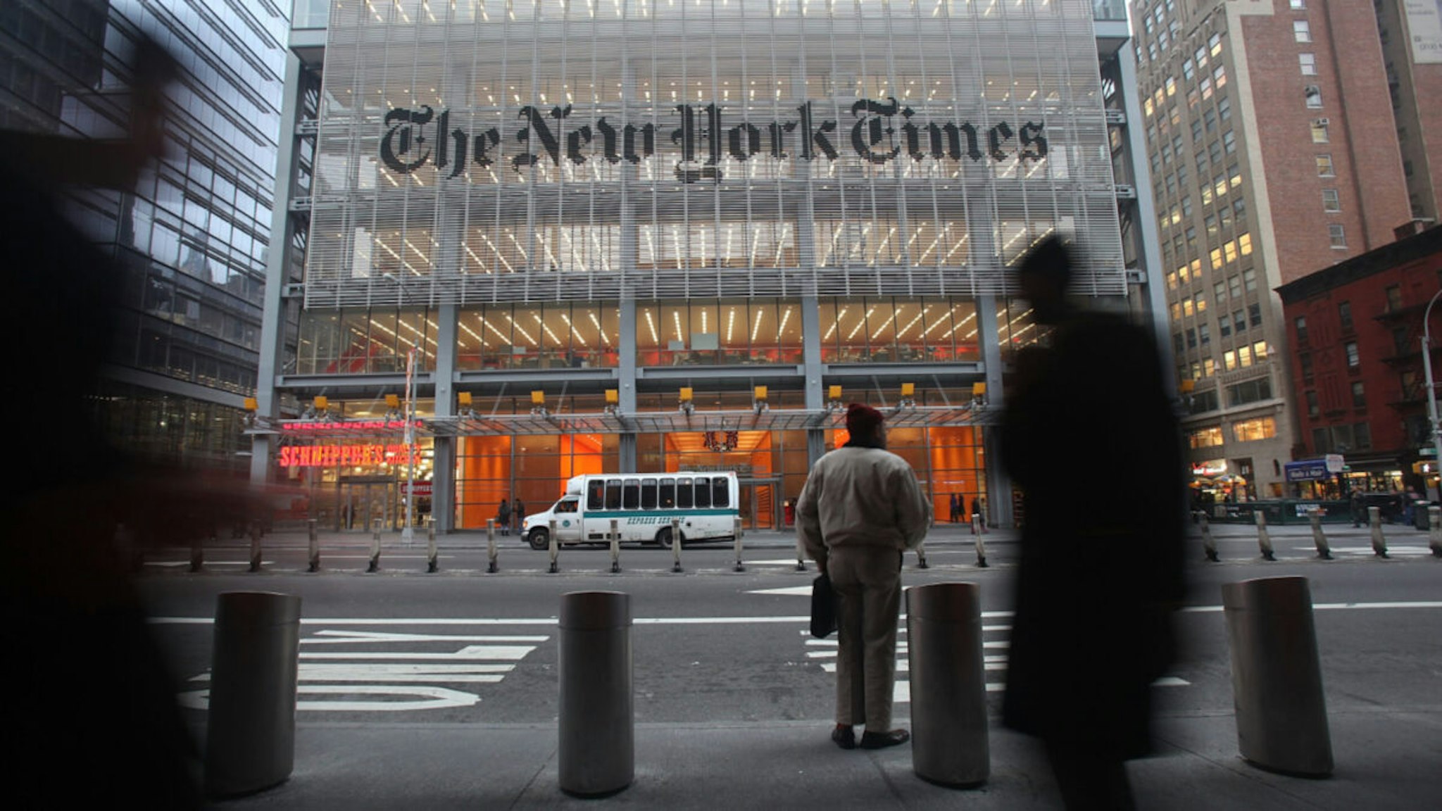 The New York Times' masthead is displayed in front of the midtown headquarters on December 7, 2009 in New York City.