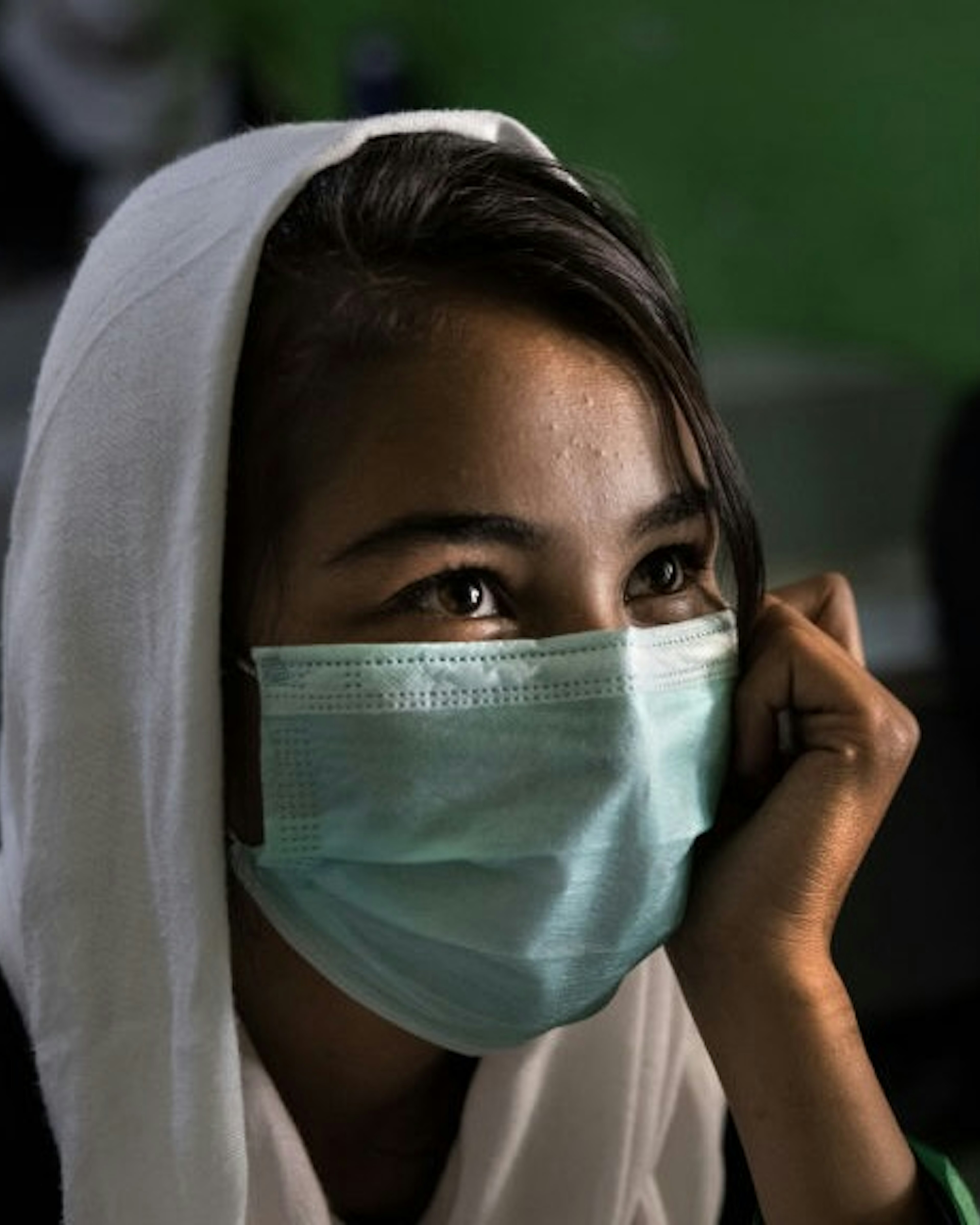Afghan Girls Education: Kabul Giirls School Reopens After Coronavirus Break KABUL, AFG- JULY 25: Zainab Mirzayee,15, listens during 10th-grade class at the Zarghoona high school on July 25 2021 in Kabul, Afghanistan. The Zarghoona girls high school is the largest in Kabul with 8,500 female students attending classes. The school opened after almost a two months break due to the coronavirus (COVID-19) pandemic. Currently there is widespread fear that the Taliban who already control around half the country will reintroduce its notorious system barring girls and women from almost all work, and access to education. The Ministry of Education has announced the opening of schools, but there are mixed reports in many areas where the Taliban have taken control or where fighting is ongoing. (Photo by Paula Bronstein /Getty Images) Paula Bronstein / Stringer via Getty Images