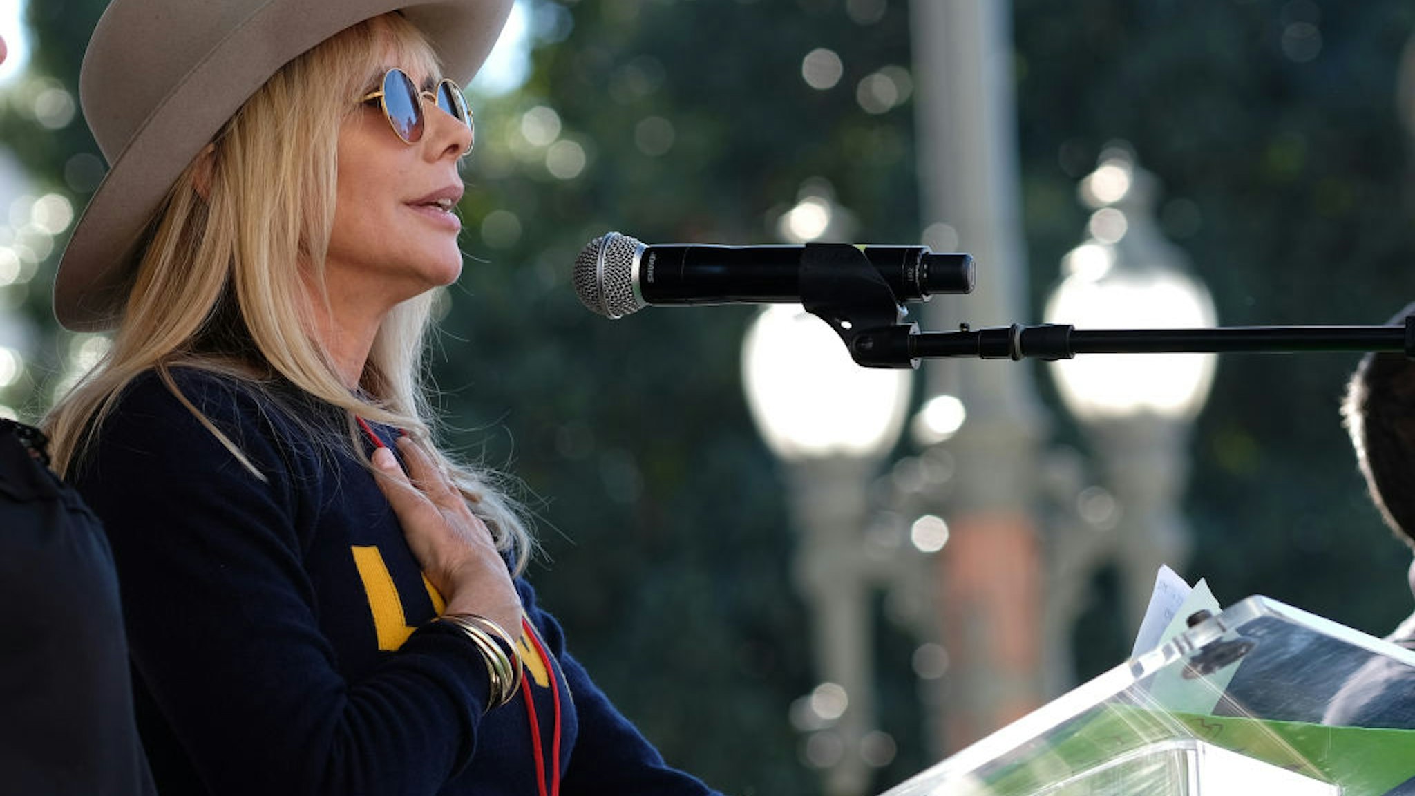 LOS ANGELES, CALIFORNIA - JANUARY 19: Actress Rosanna Arquette speaks at the Women's March California 2019 on January 19, 2019 in Los Angeles, California. Demonstrations are slated to take place in cities across the country in the third annual event aimed to highlight social change and celebrate women's rights around the world.