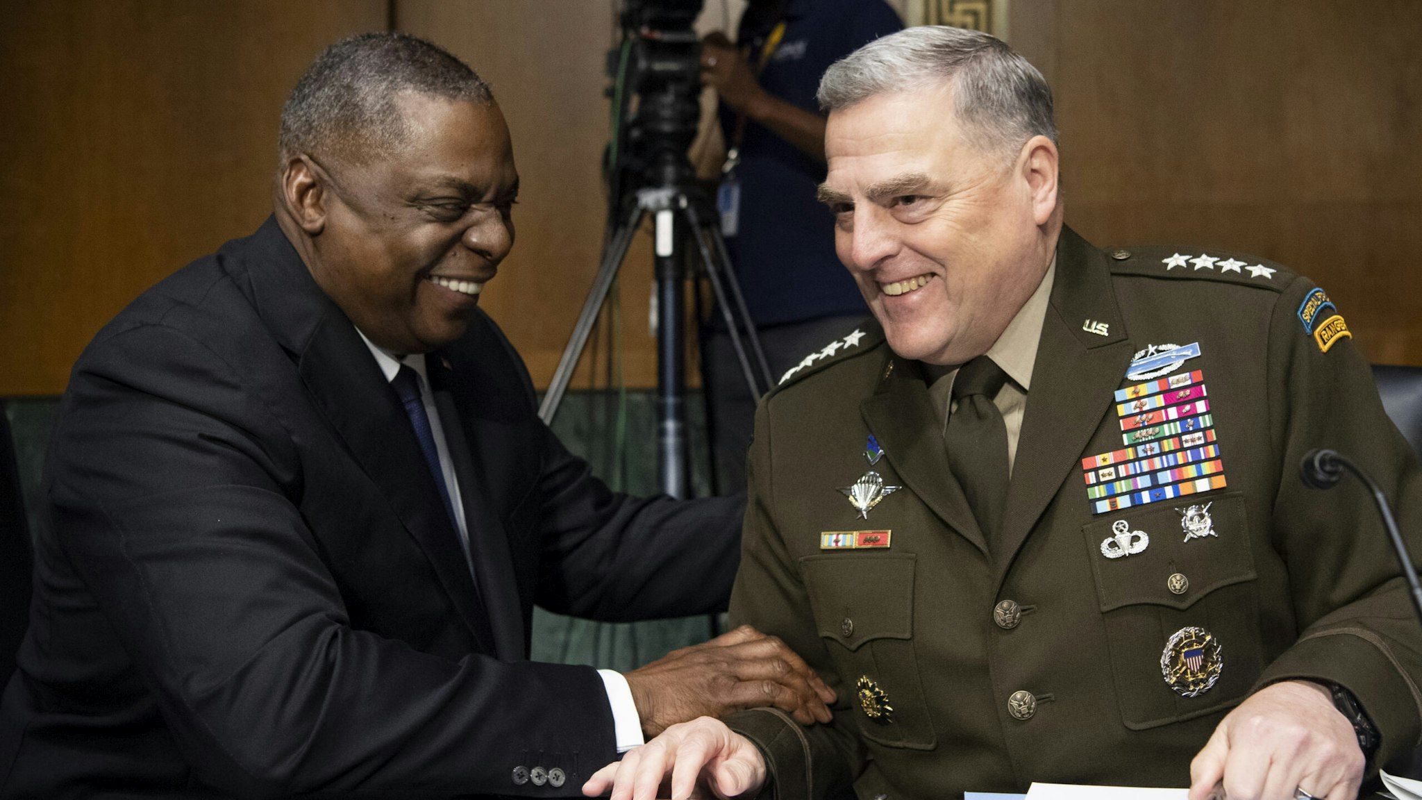 WASHINGTON, DC - JUNE 17: Secretary of Defense Lloyd Austin, left, and Chairman of the Joint Chiefs of Staff Gen. Mark Milley talk before the start of the Senate Appropriations Committee hearing on "A Review of the FY2022 Department of Defense Budget Request' on June 17, 2021 in Washington, DC. The hearings are to examine proposed budget estimates and justification for fiscal year 2022 for the Department of Defense.