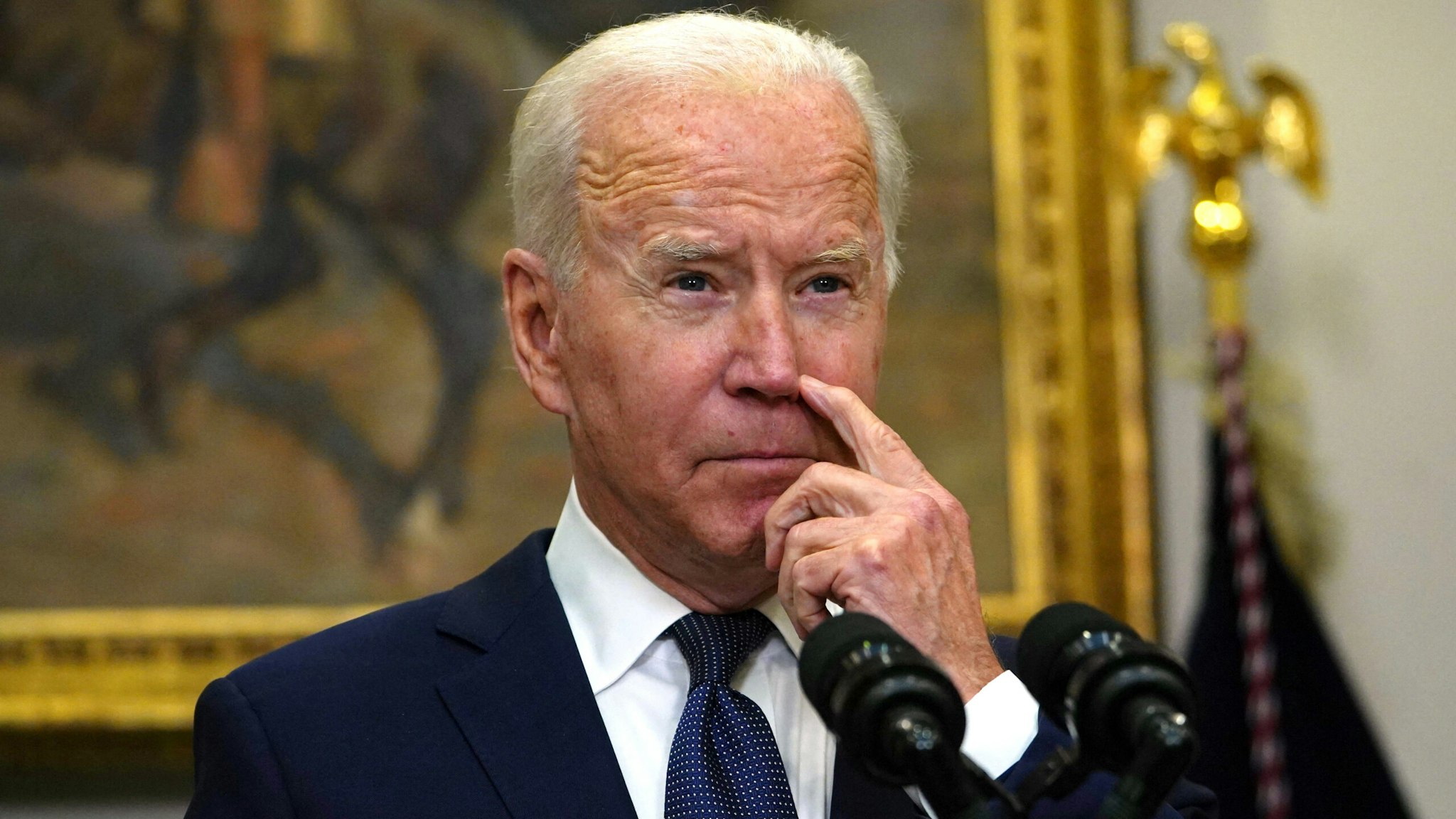 US President Joe Biden speaks during an update on the situation in Afghanistan and the effects of Tropical Storm Henri in the Roosevelt Room of the White House in Washington, DC on August 22, 2021.