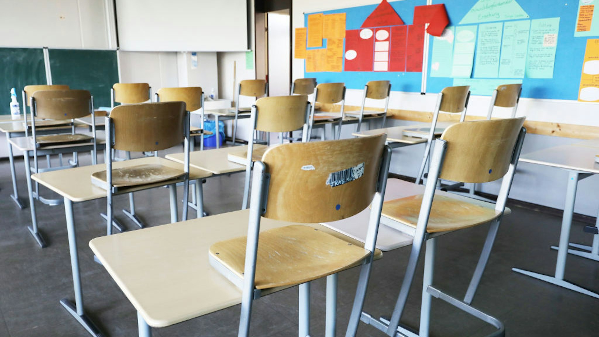 23 April 2021, North Rhine-Westphalia, Kaarst: Chairs are pulled up in an empty classroom at Albert Einstein High School. Photo: Oliver Berg/dpa