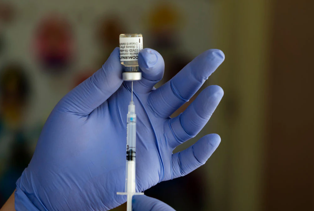 UKRAINE - 2021/06/30: A health worker prepares a syringe with the Pfizer / BioNTech Comirnaty COVID-19 vaccine.